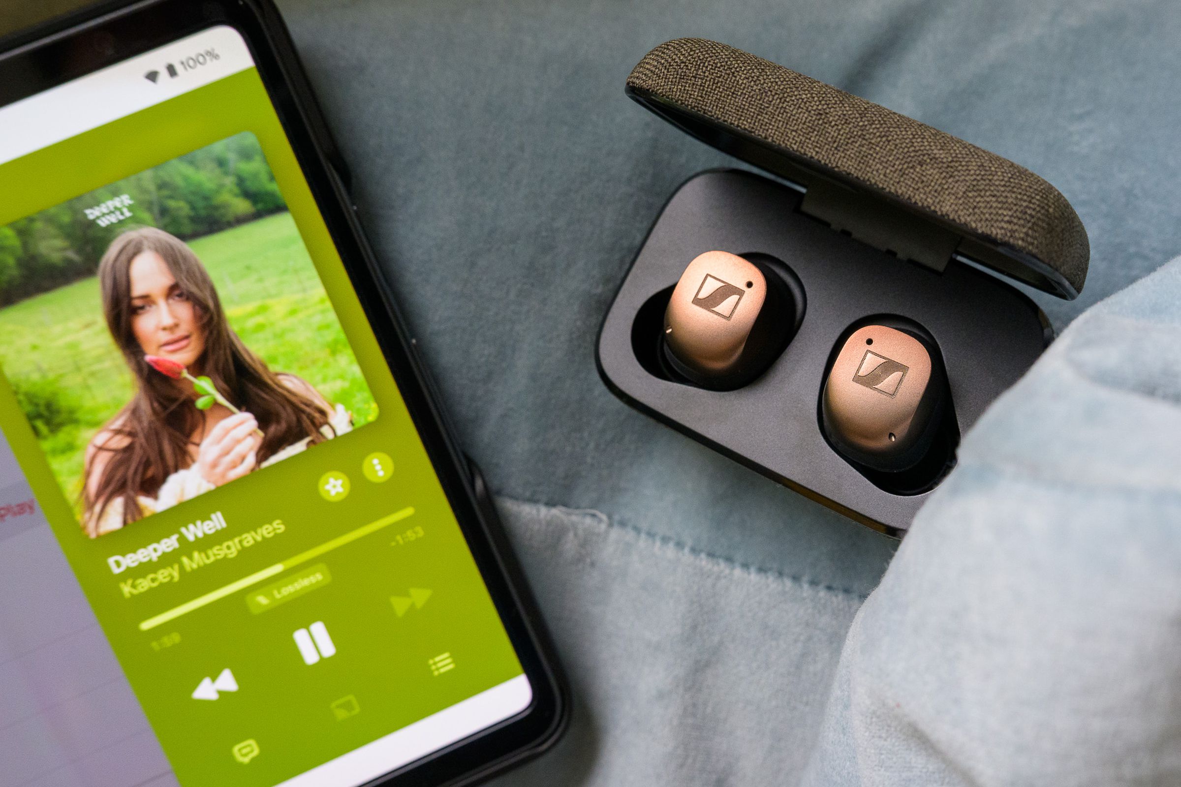 A photo of Sennheiser’s Momentum True Wireless 4 earbuds in copper.