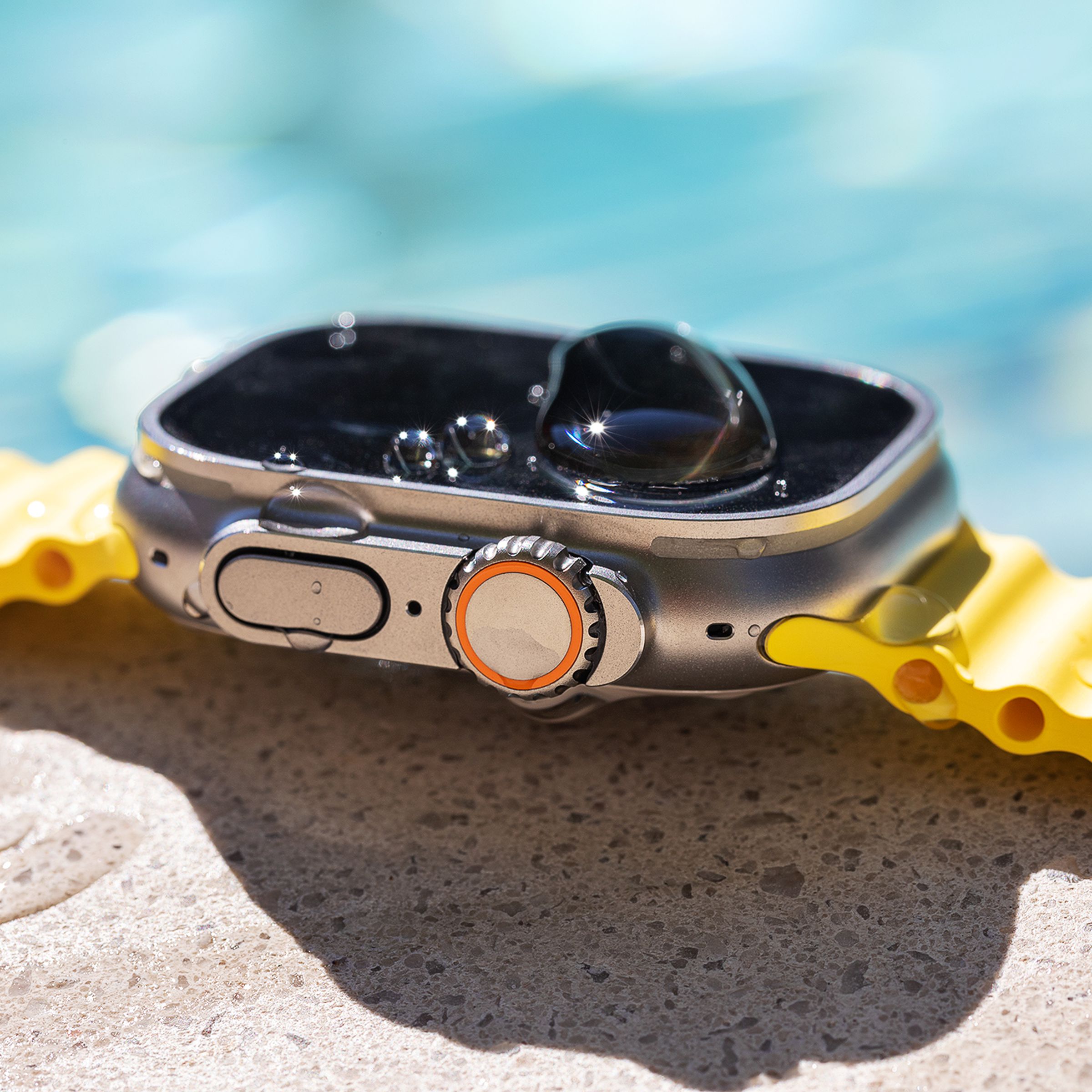 Side view of Apple Watch with Ocean band at the pool