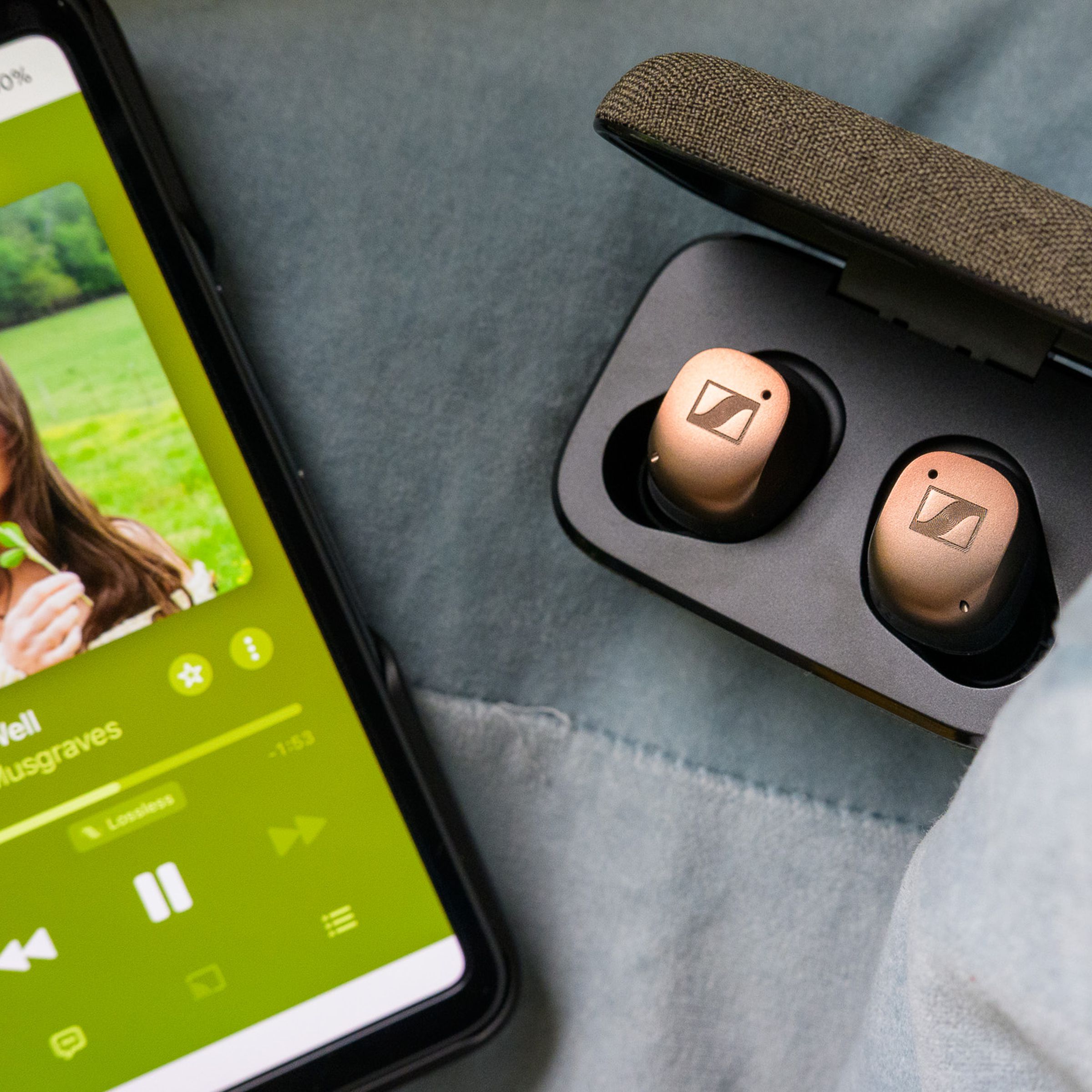 A photo of Sennheiser’s Momentum True Wireless 4 earbuds in copper.