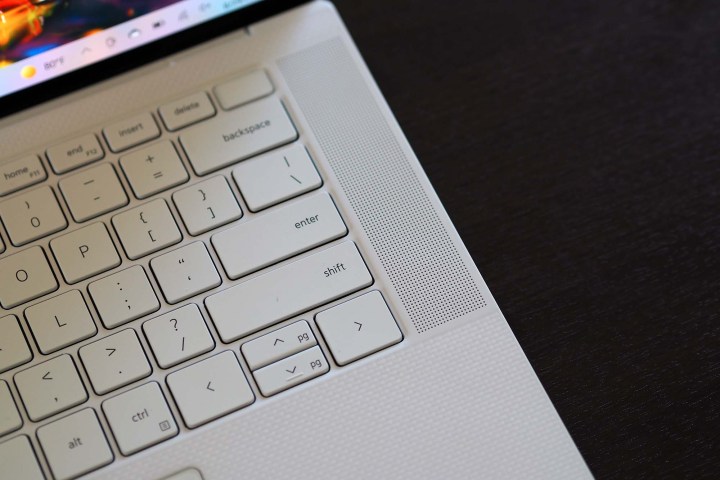 Closeup on the Dell XPS 15 OLED laptop's right size speaker.