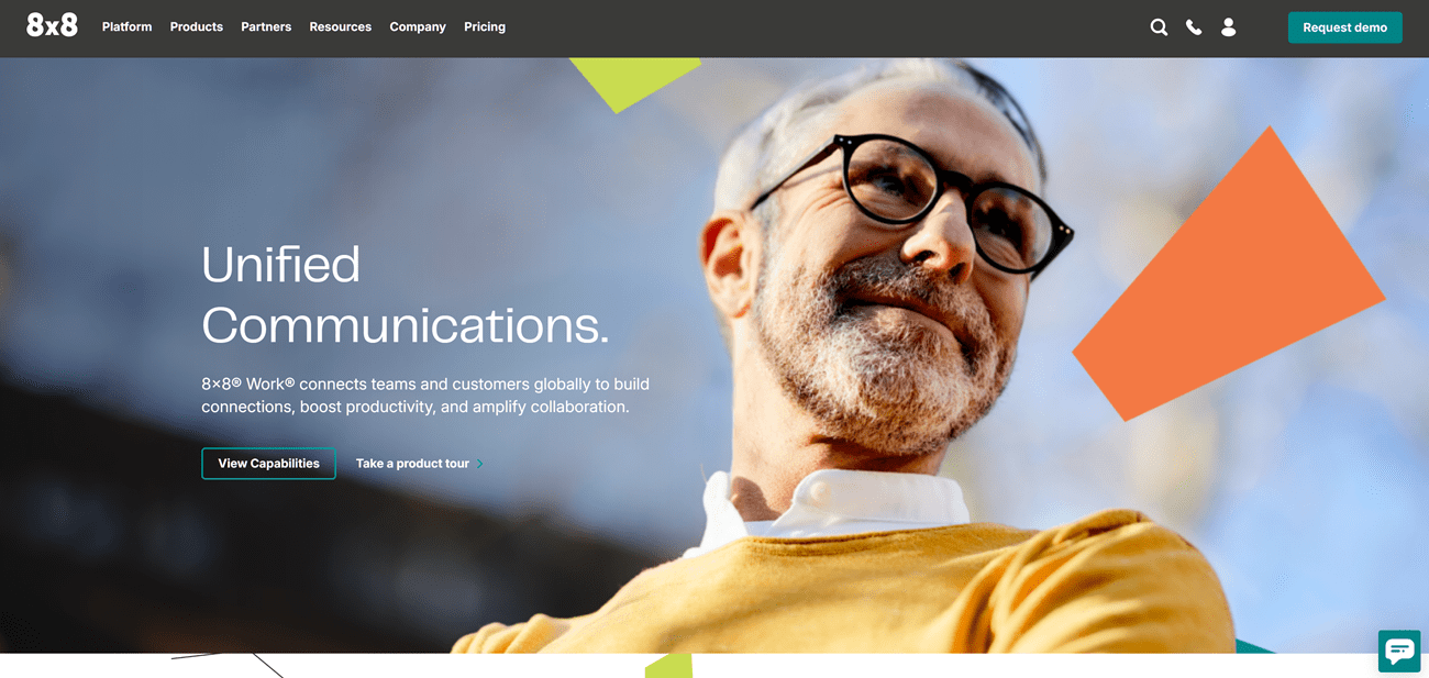 8x8's website showing a man wearing glasses in a yellow shirt with the text Unified Communications overlaid on top. 