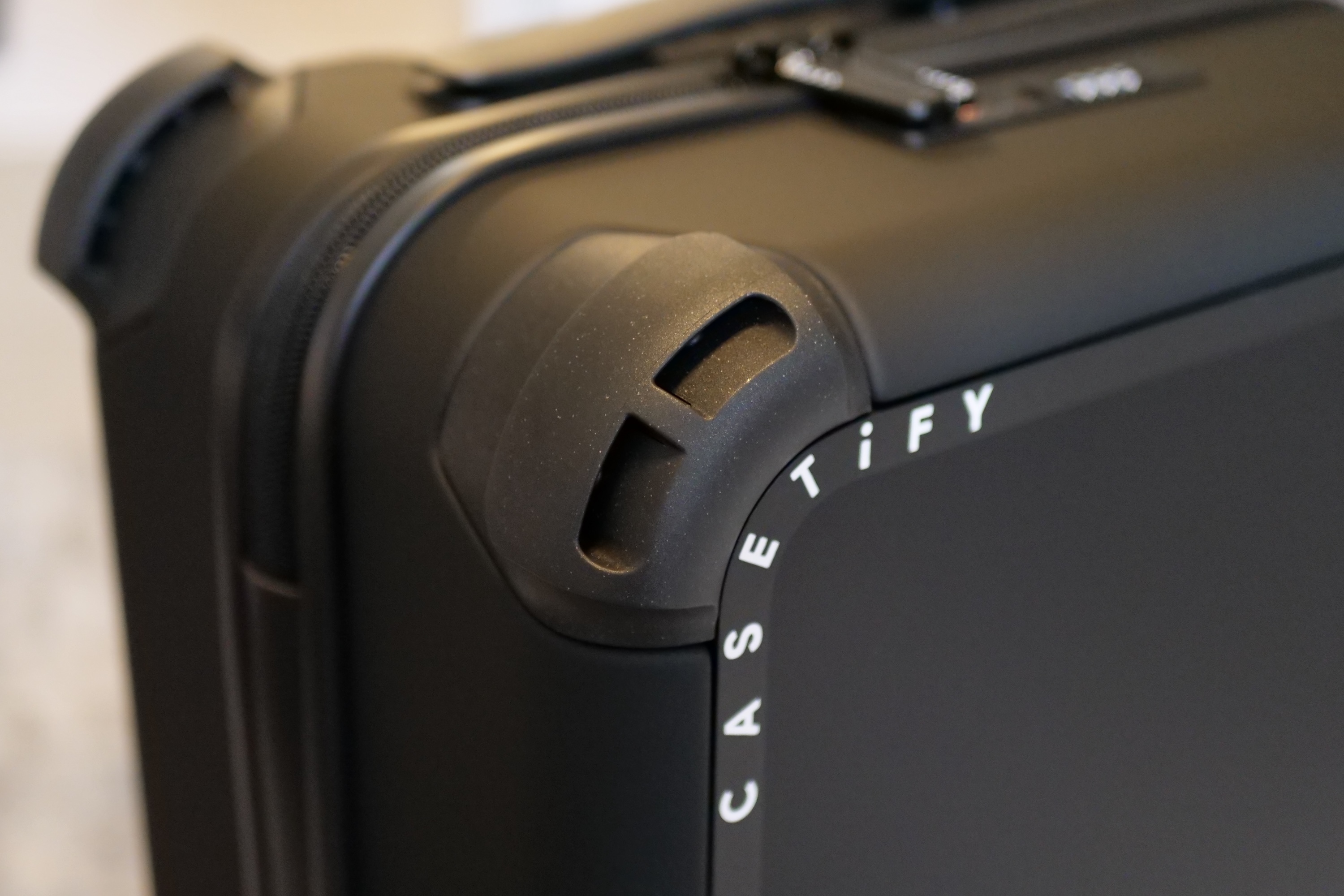 The protective corner on the Casetify Carry-On Suitcase.