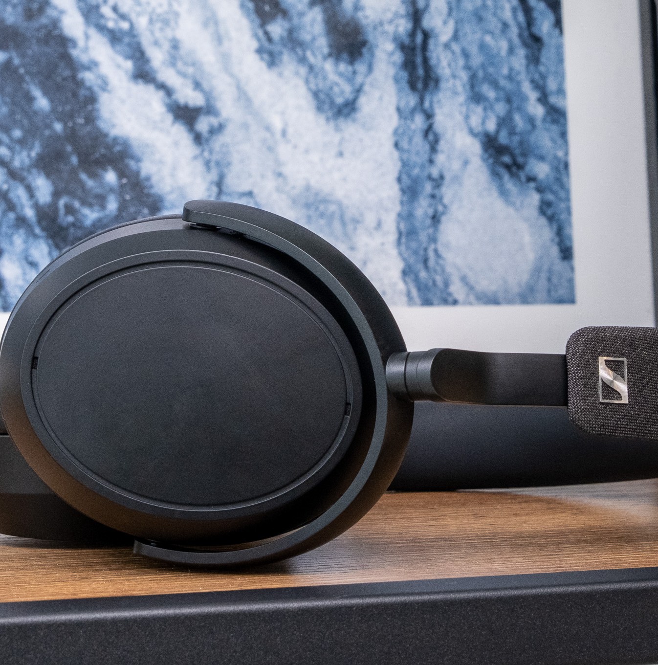 A photo of Sennheiser’s Momentum 4 Wireless headphones on a table.