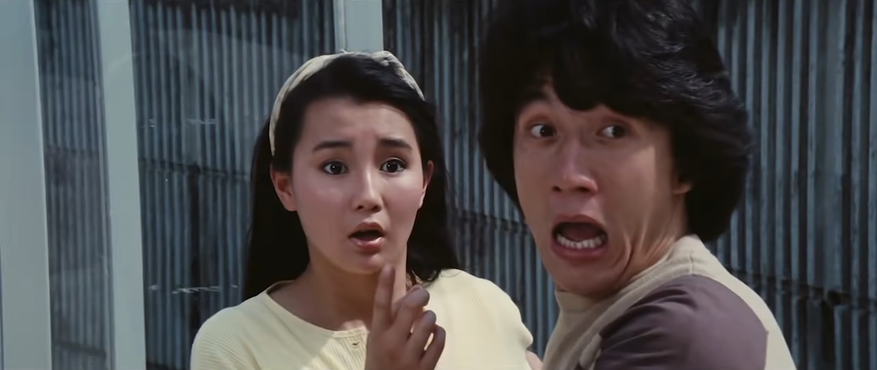 A woman and a man looking frightened in