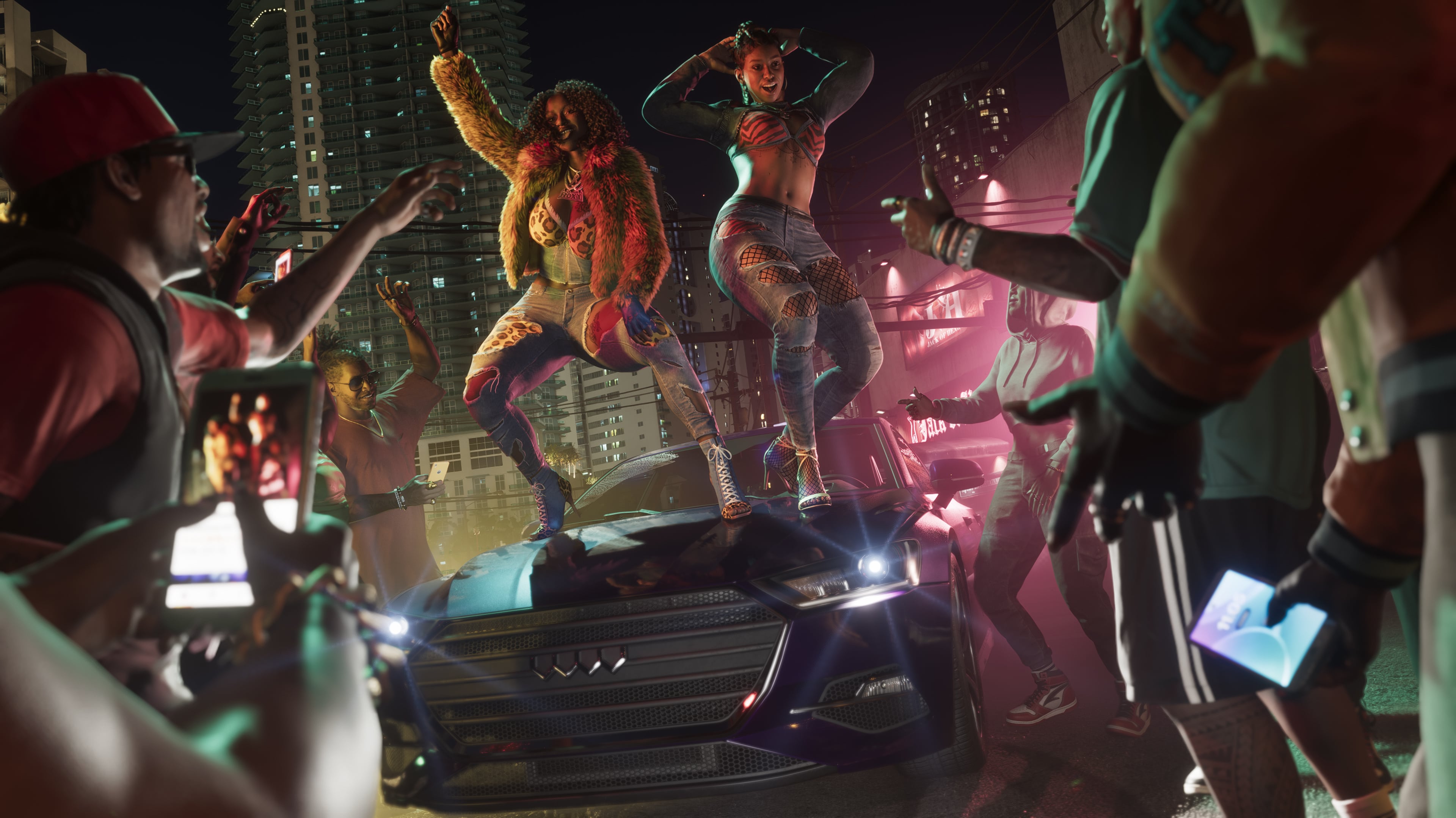 Women dance on a car in Grand Theft Auto 6.