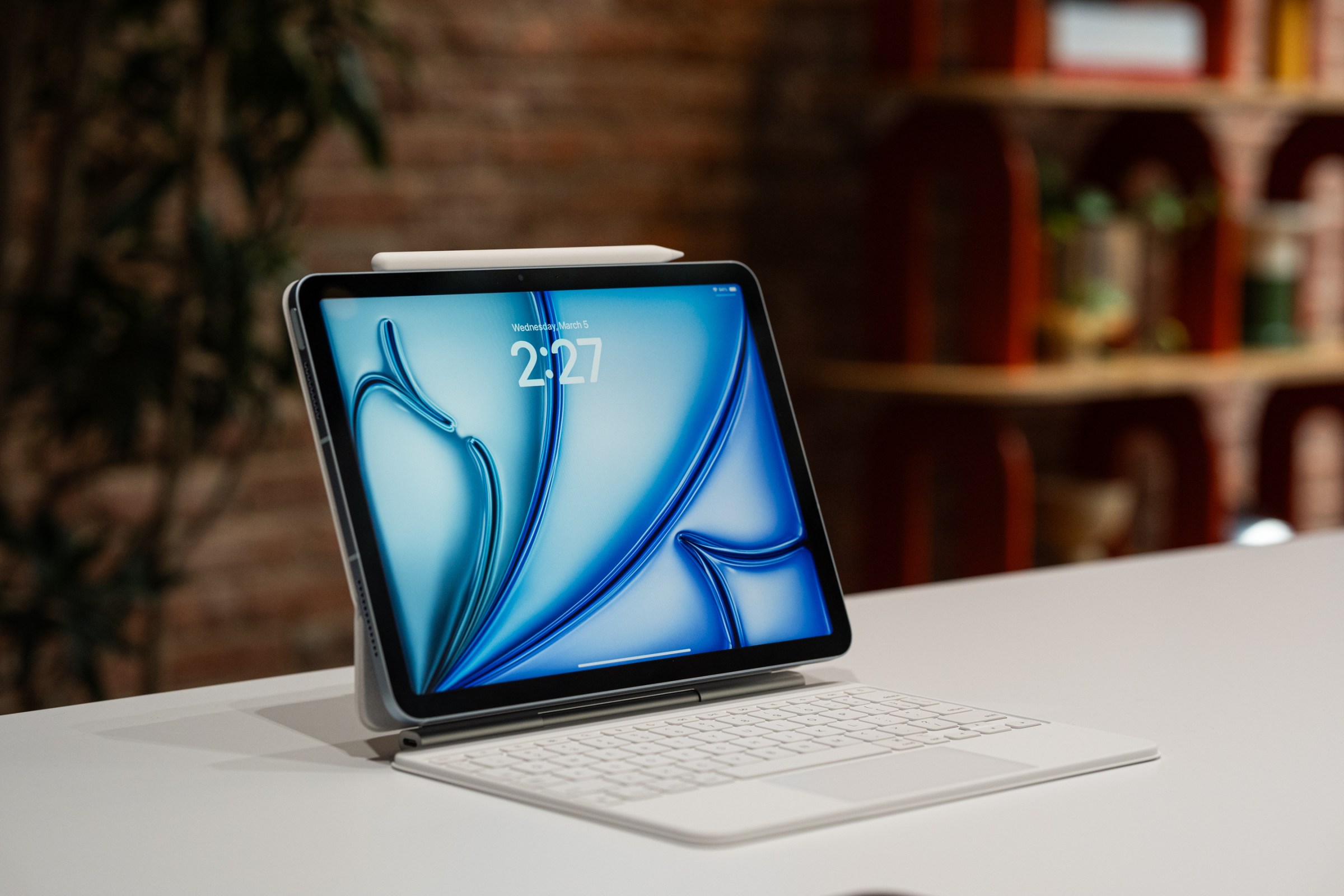 A photo of an iPad Air on a table.