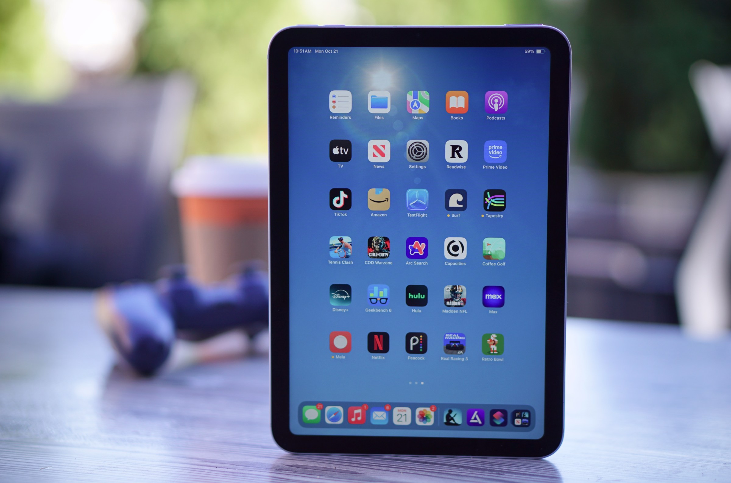 A photo of the iPad Mini, in portrait mode, on a table.