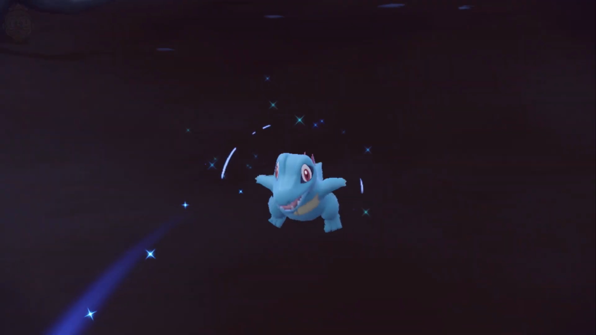 Totodile in the water in Pokémon.