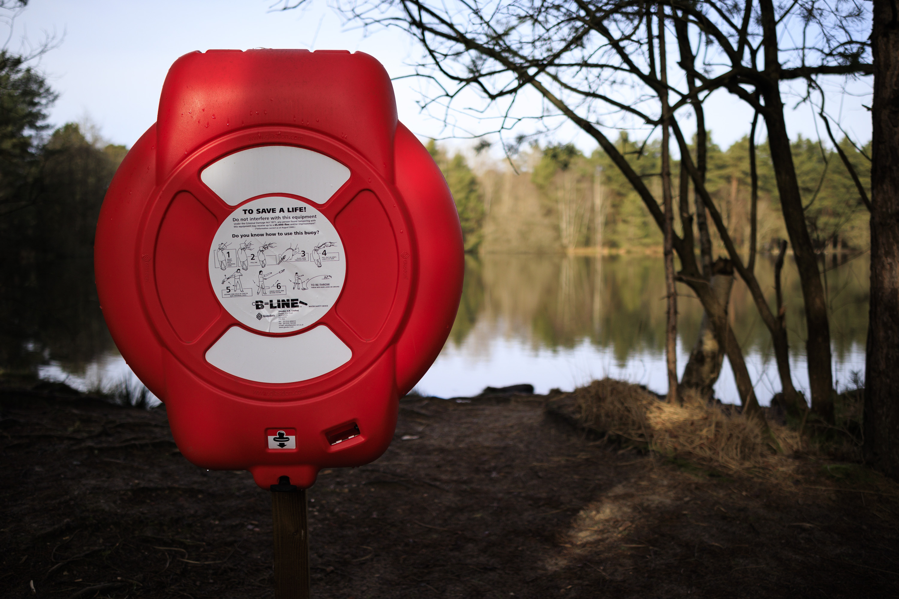 Sigma 23mm F1.4 DC DN Contemporary image gallery: a life ring next to a lake on a sunny day