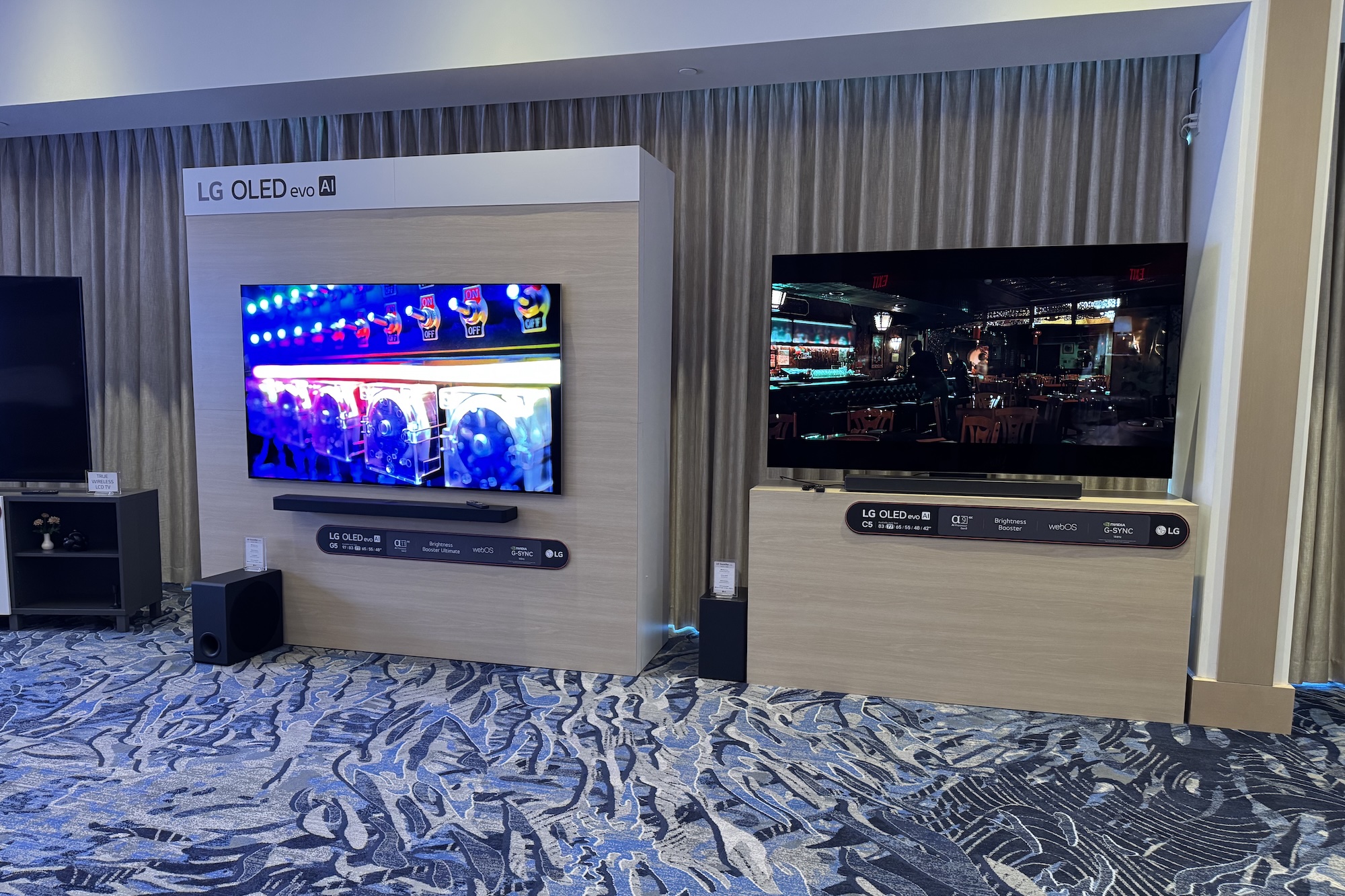 The LG G5 and C5 OLED TVs in LG's CES 2025 suite.
