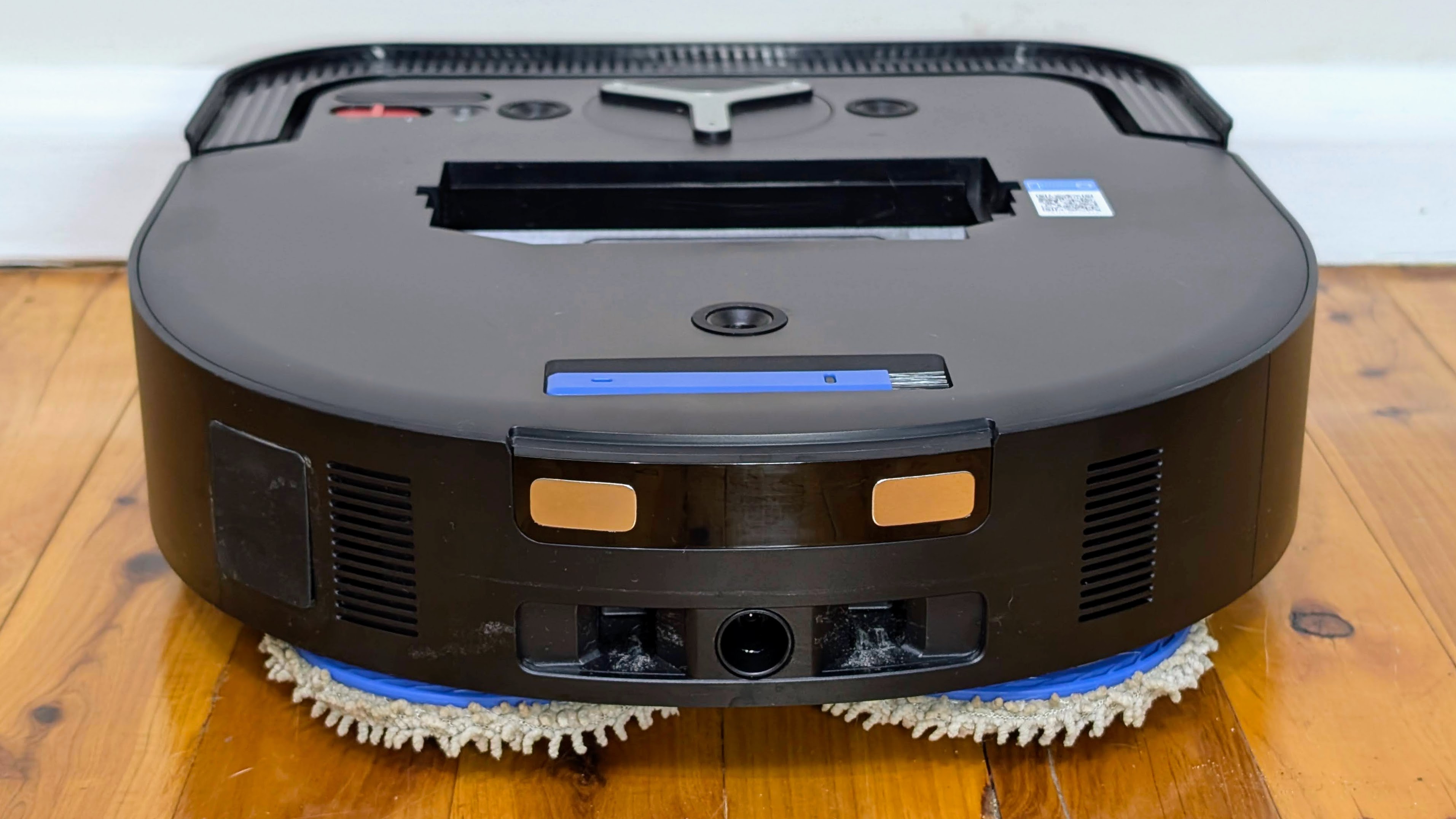 Ecovacs X5 Pro Omni robovac from the rear, with top cover removed