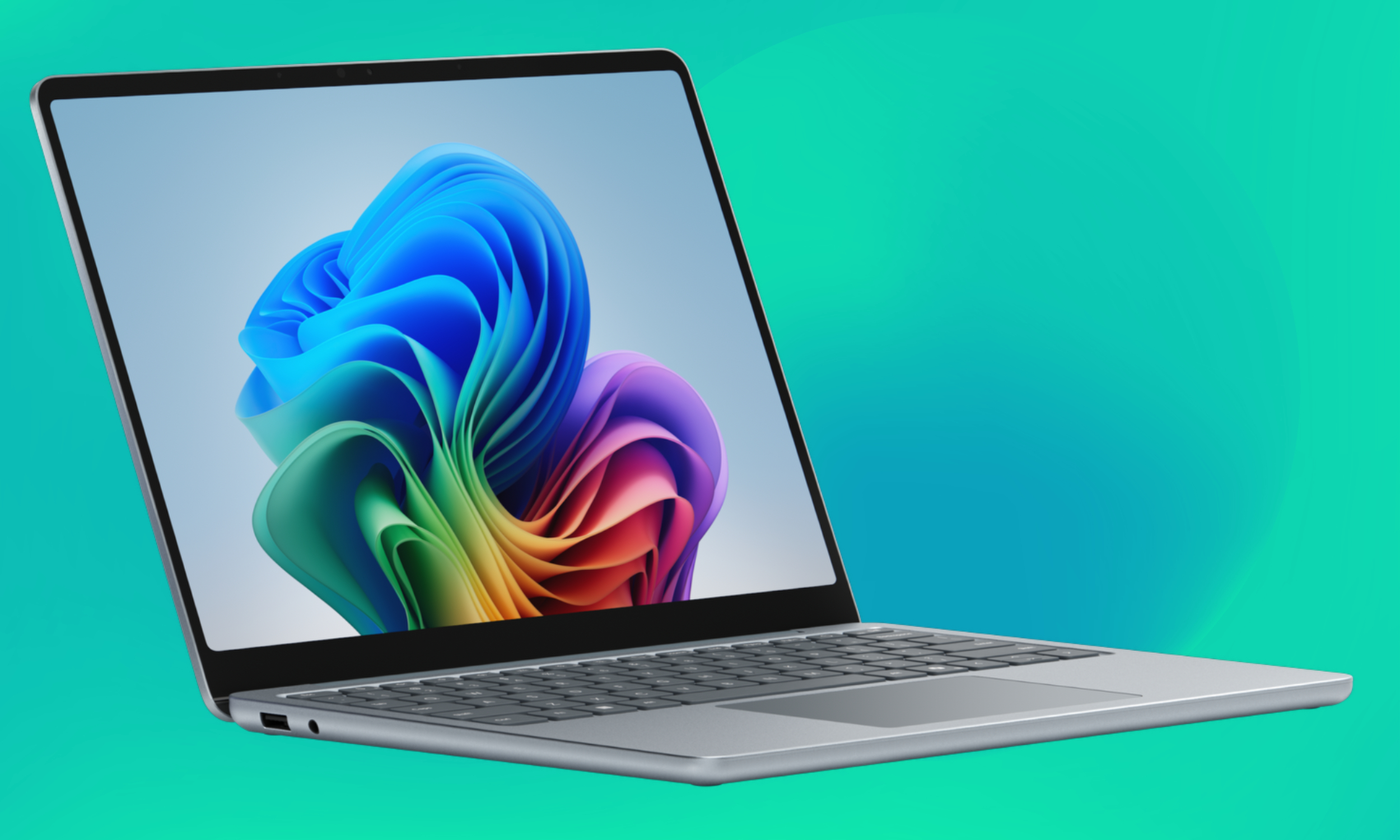 13-inch Microsoft Surface Laptop shown silver color.
