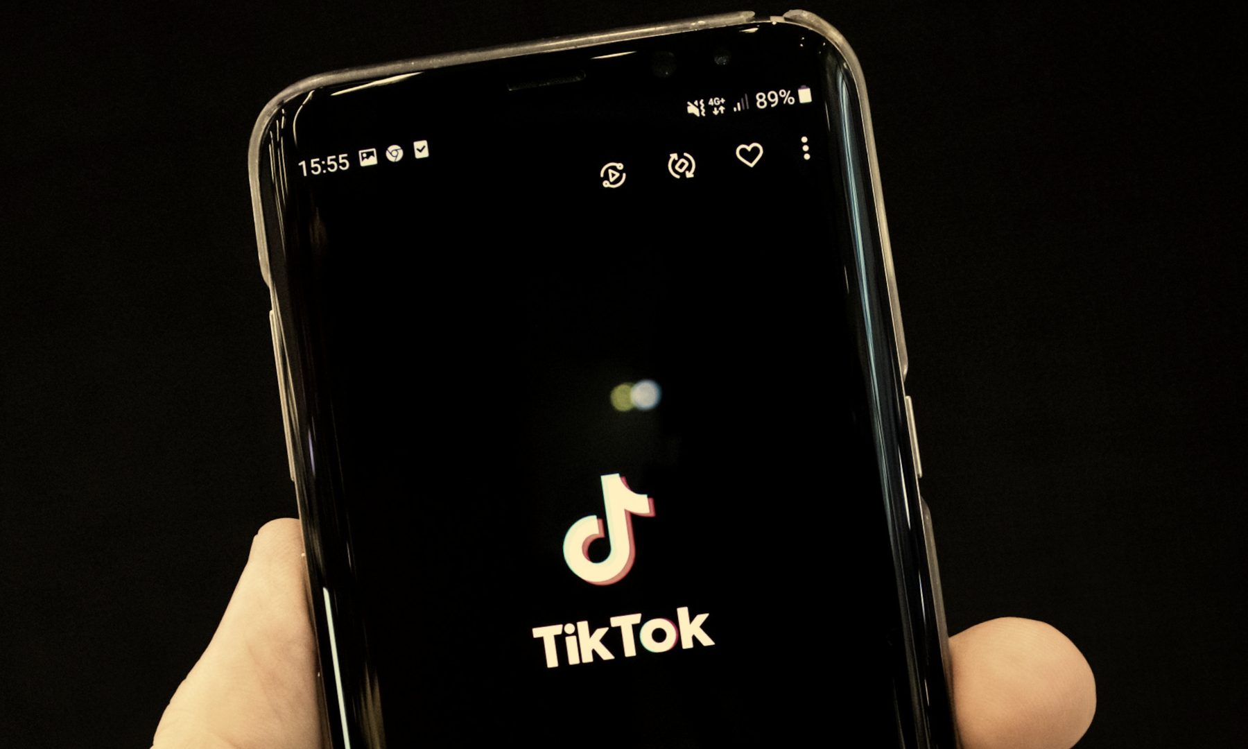 TikTok splash screen on an Android phone.