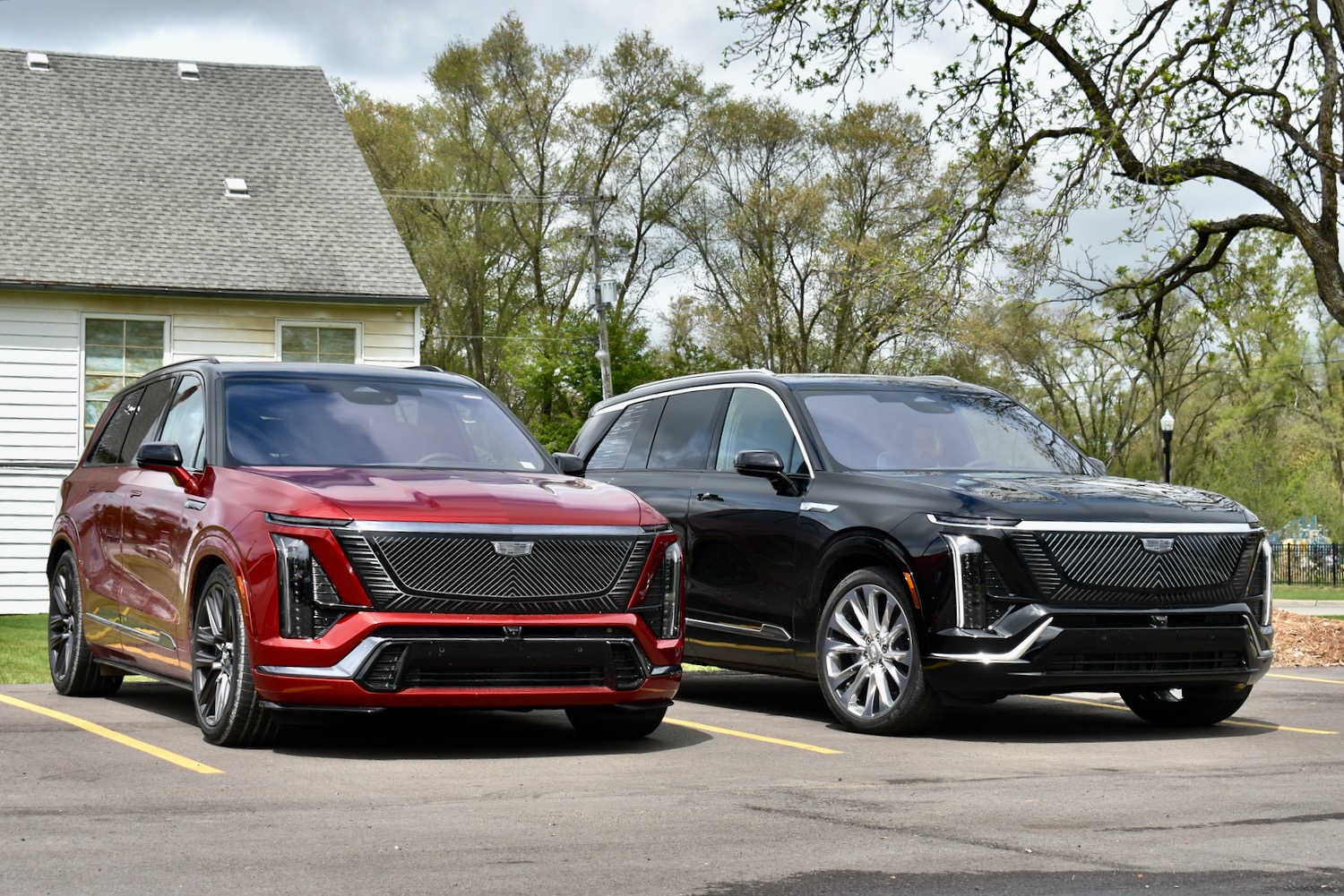A pair of 2026 Cadillac Vistiq electric SUVs parked side by side.