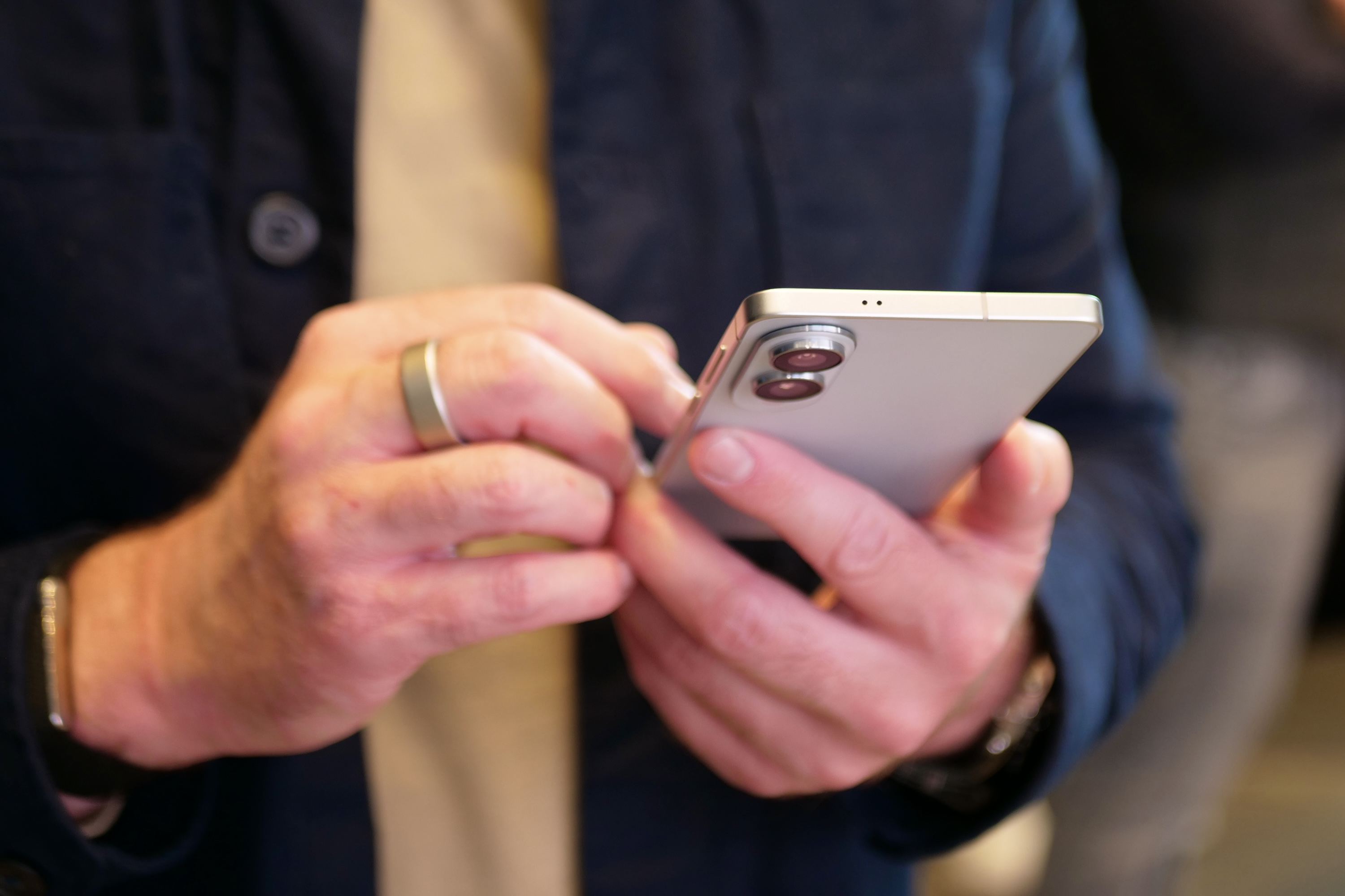A person holding the Samsung Galaxy S25 Edge.