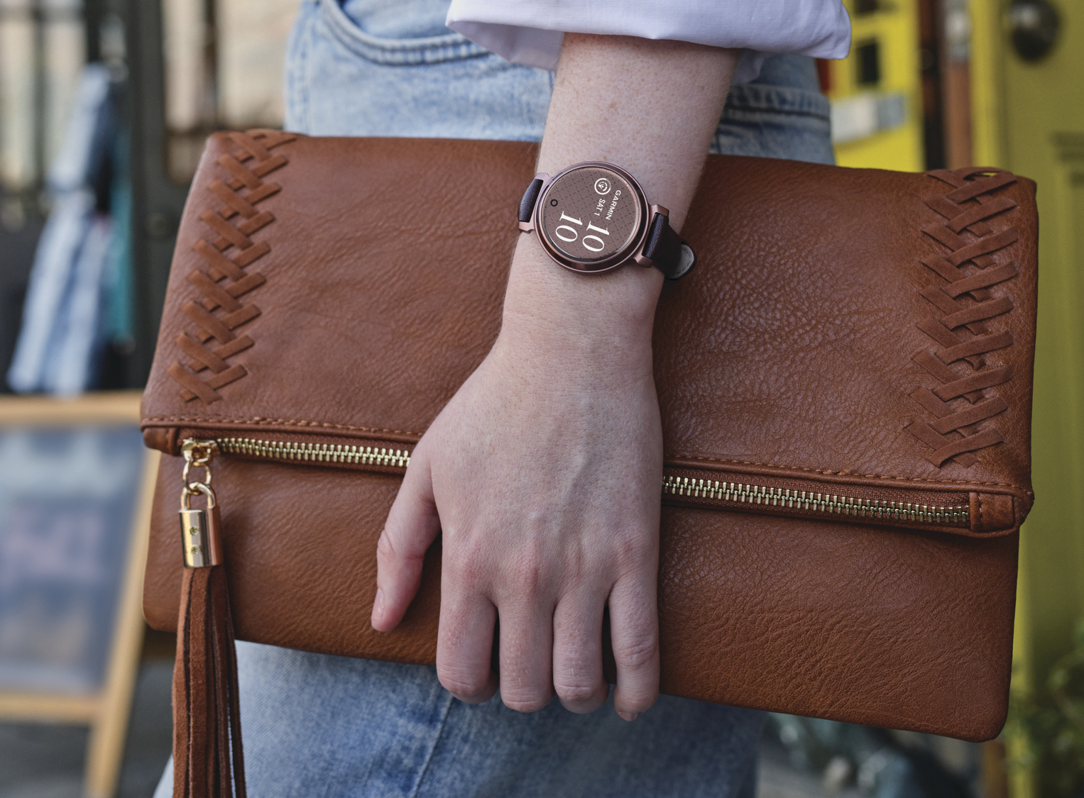 Garmin Lily 2 smartwatch being worn on wrist.