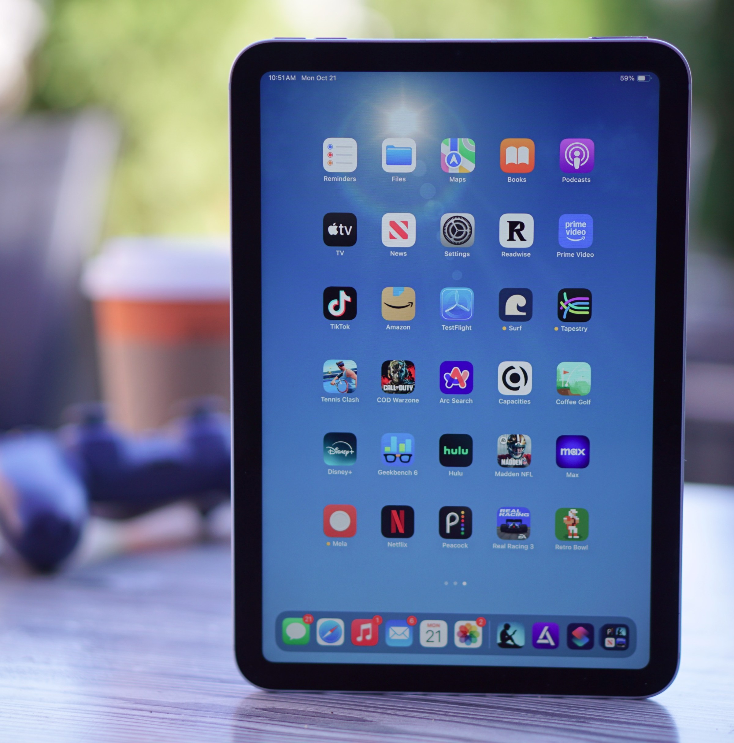 A photo of the iPad Mini, in portrait mode, on a table.