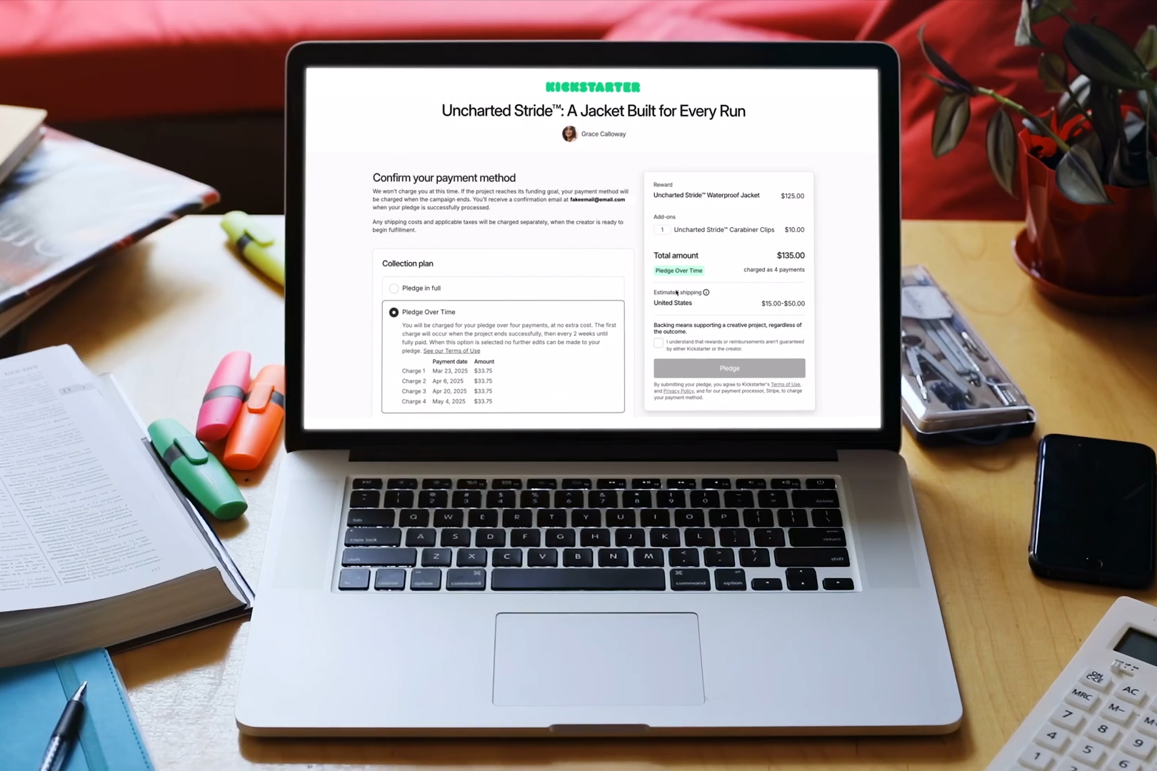 A laptop on a cluttered desk with the Kickstarter website on screen.