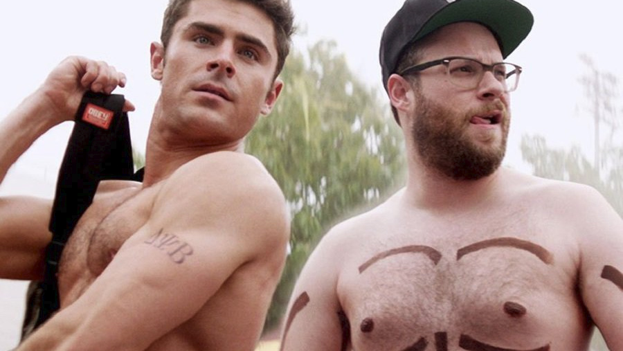 A shirtless Zac Efron and Seth Rogen in Neighbors 2.