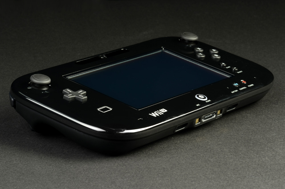 A Nintendo Wii U gamepad flat on a table.