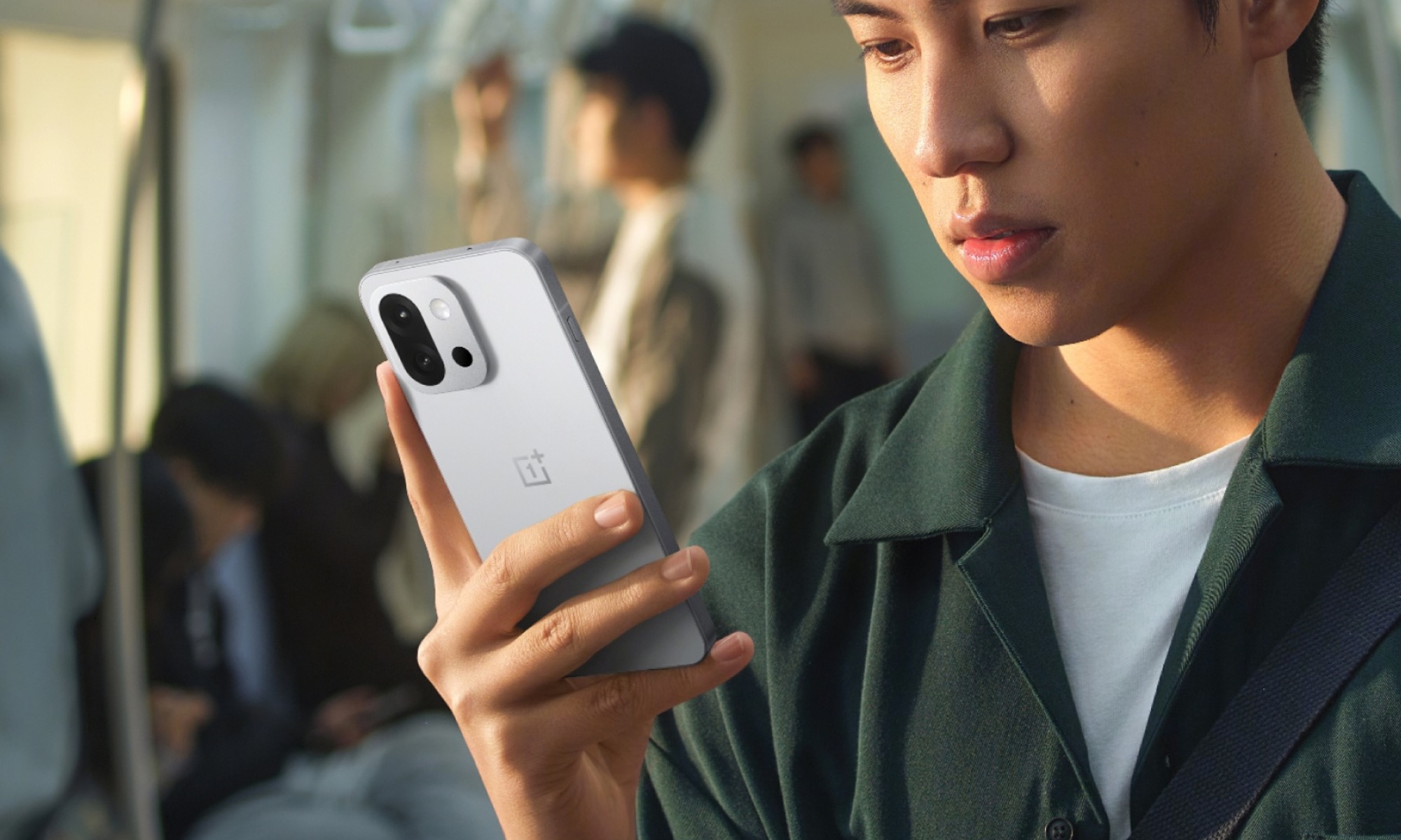 Person using the OnePlus 13T.
