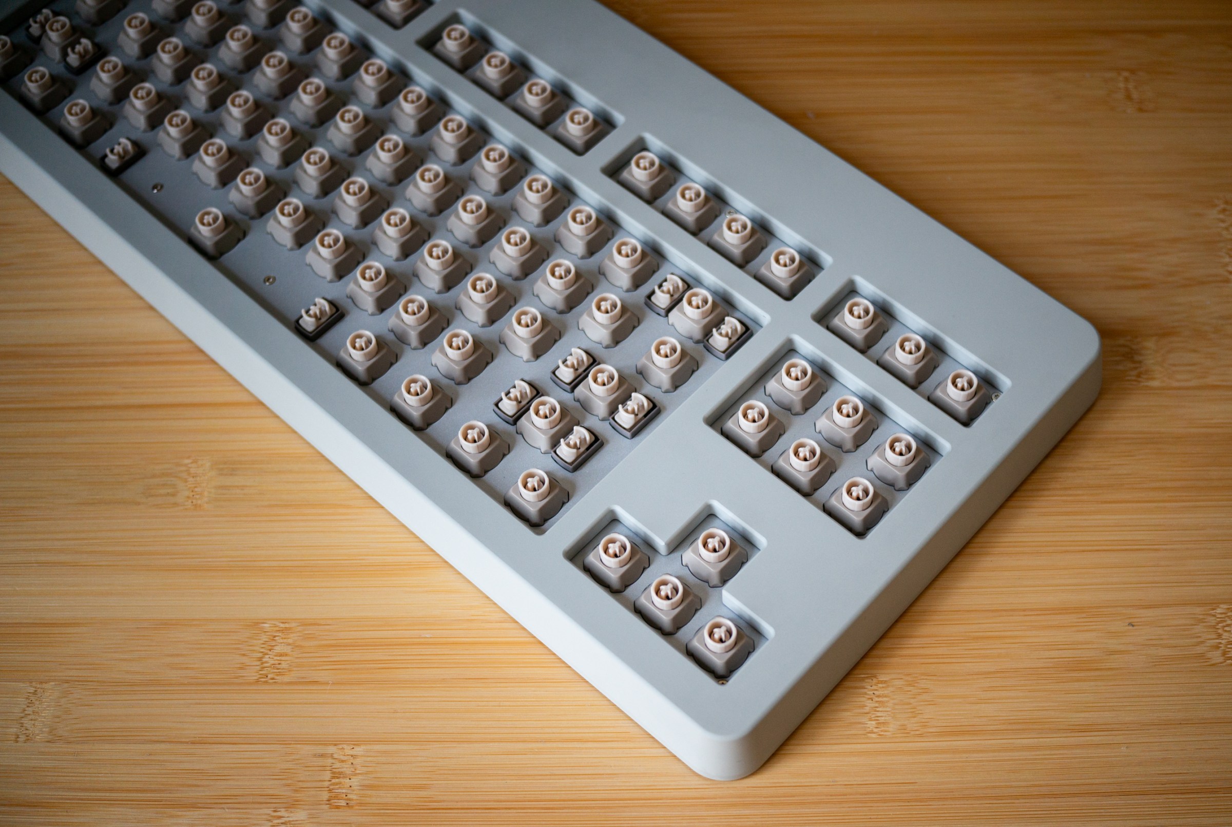 Custom switches, custom stabilizers, and a 5mm chromed brass switchplate.