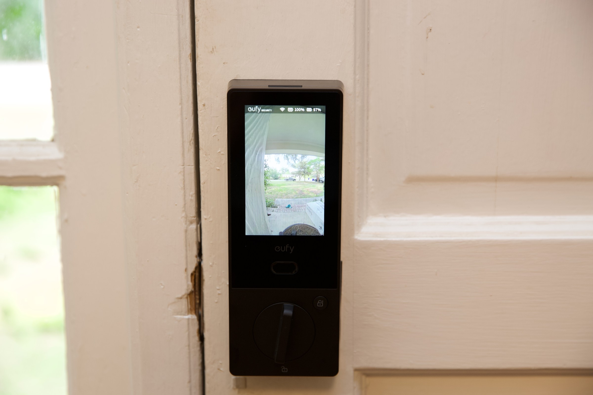 The rear of the lock is a screen that turns on with motion and when someone rings the doorbell. It can be manually activated by a button on the back.