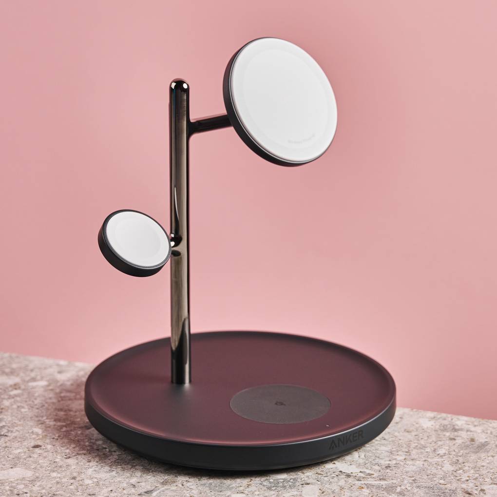 The Anker MagGo Wireless Charging Station 3-in-1 Stand against a pink background.