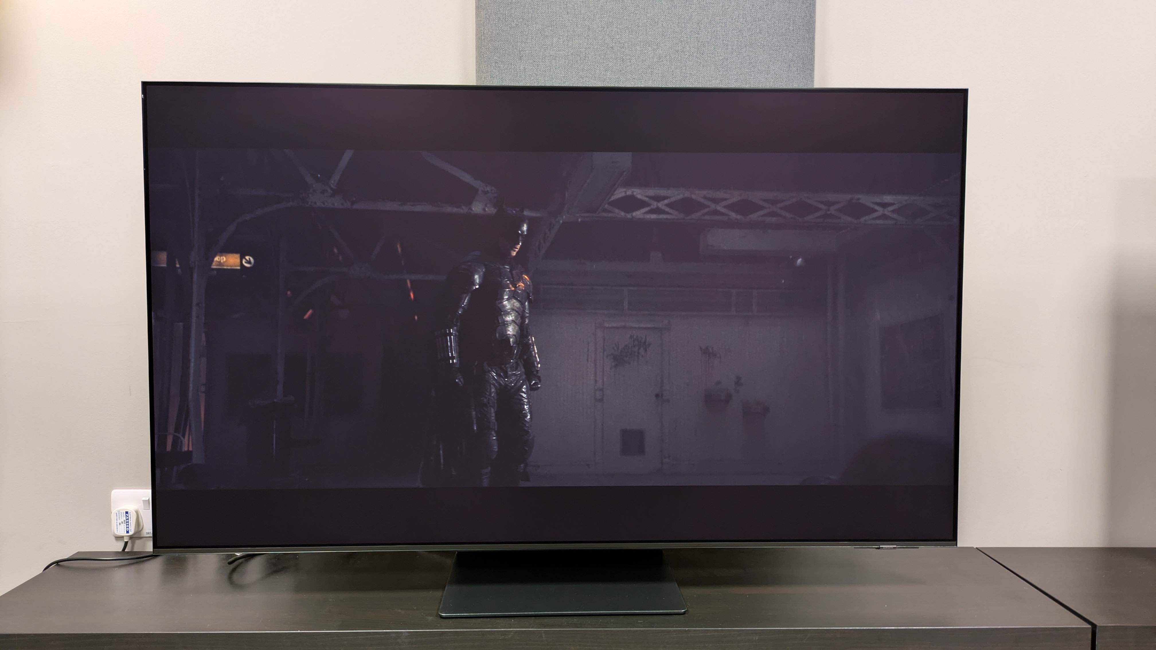 Samsung S95F in Filmmaker Mode with Active dynamic tone mapping with Batman on screen 