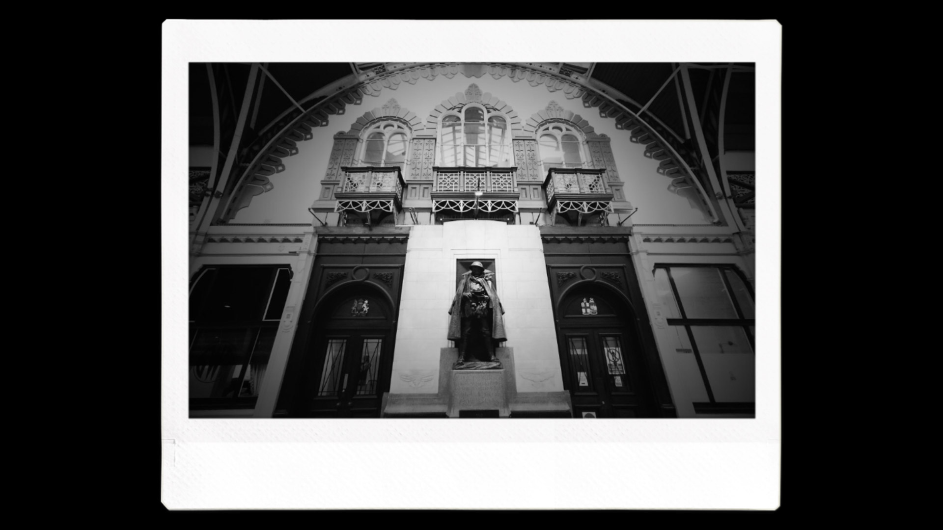 An Instax image printout of a sculpture in black and white