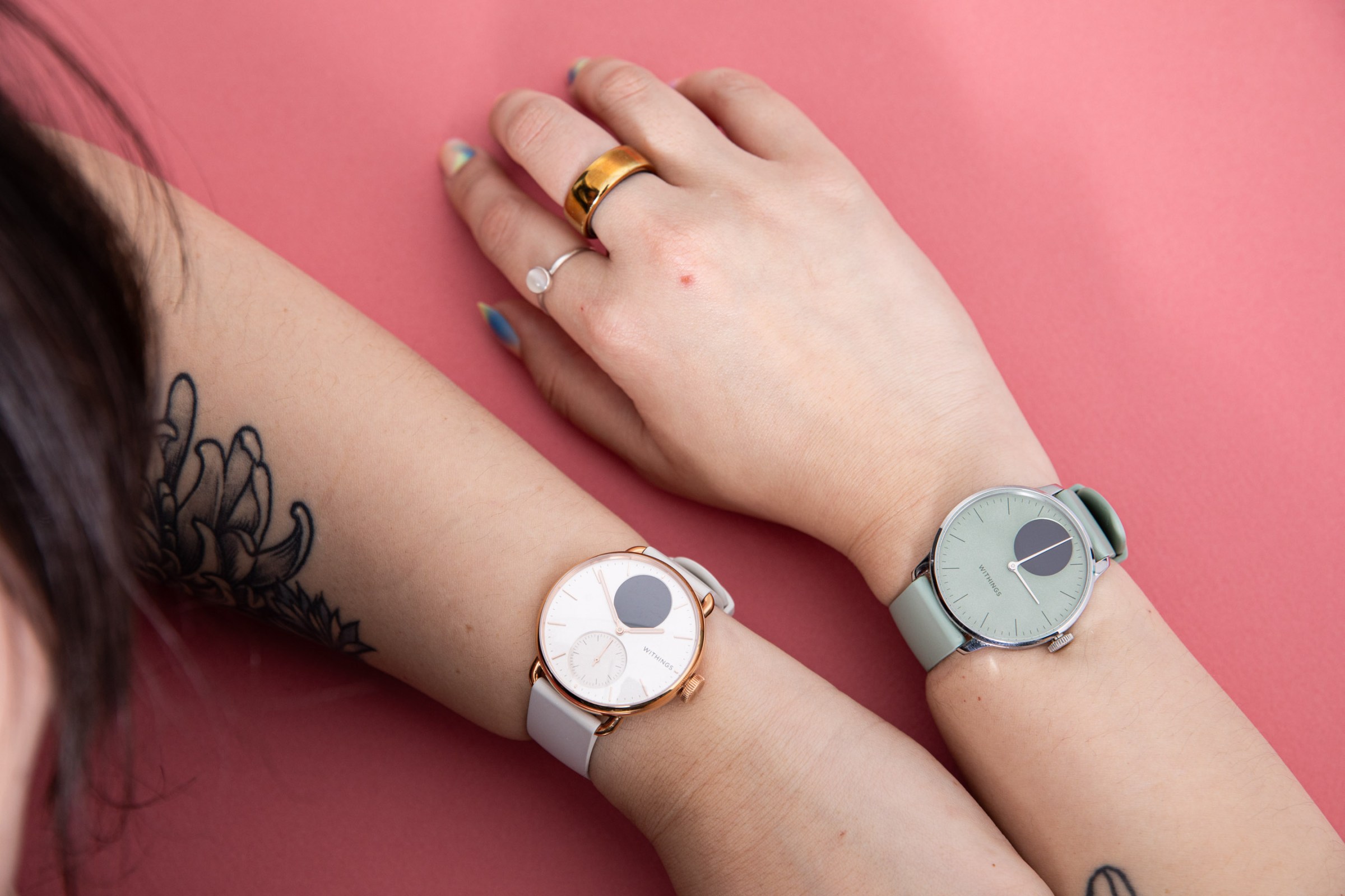 Overhead view of person wearing Withings ScanWatch 2 and ScanWatch Light