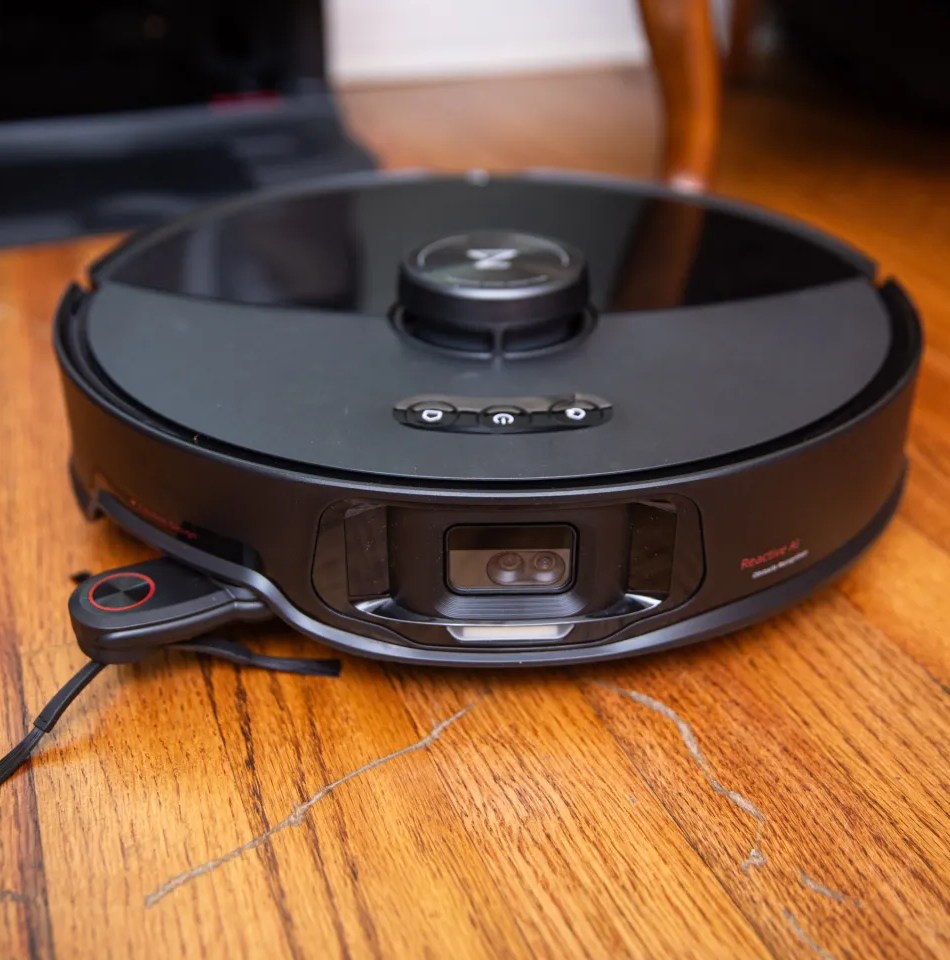 The front of the Roborock S8 MaxV Ultra as it rests on hardwood floor.
