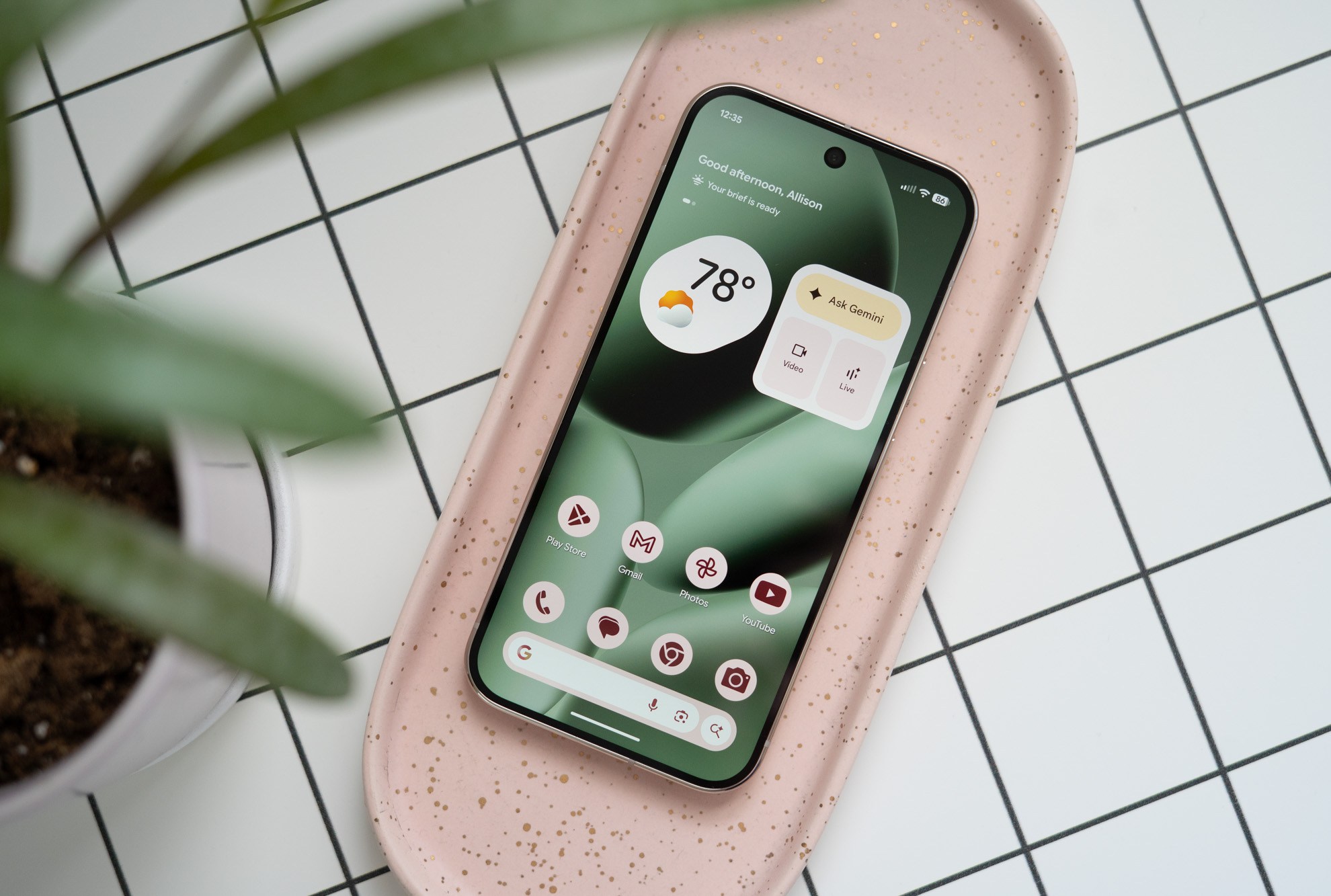 Google Pixel 10 Pro on a desk showing home screen