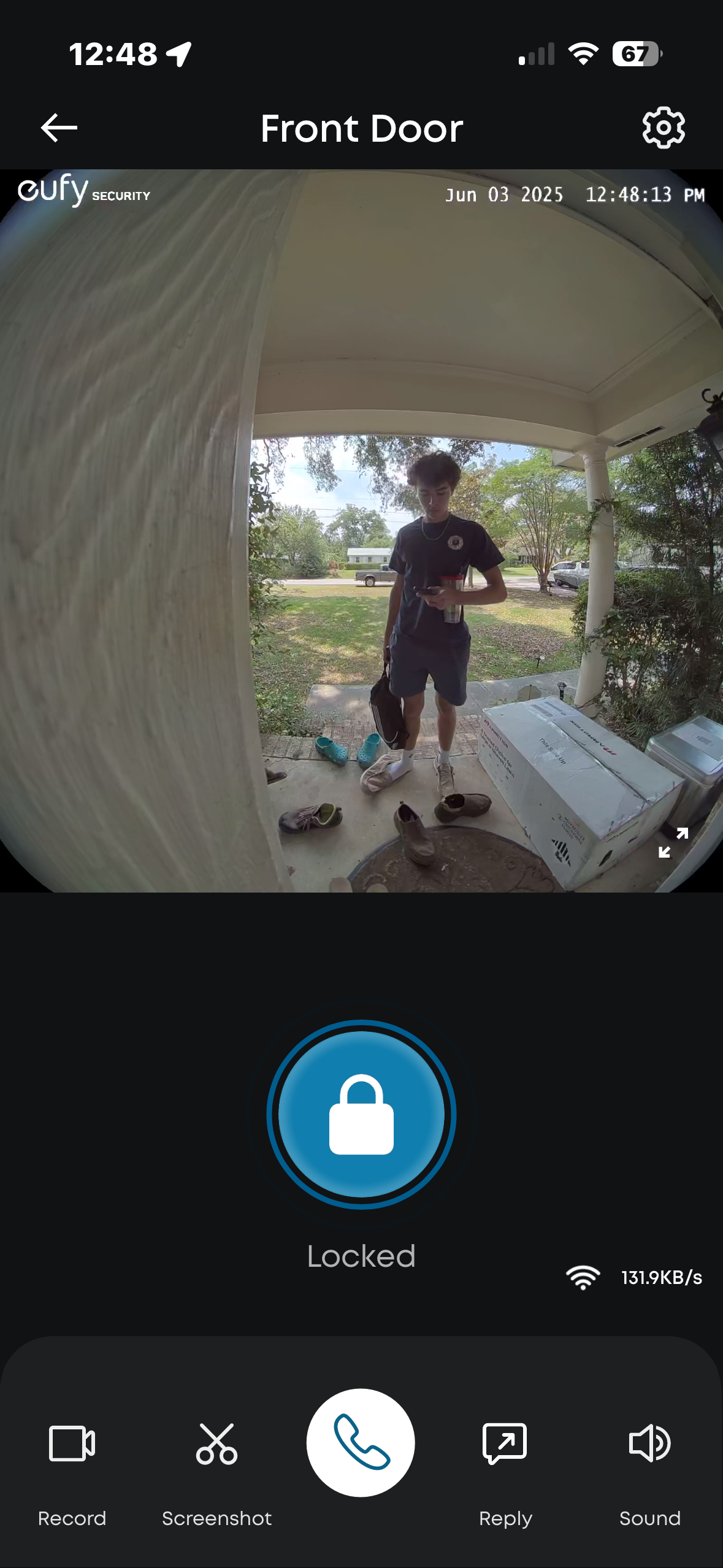 The camera’s aspect ratio shows a head-to-toe view so you can see packages and people. The app lets you lock or unlock the door while viewing the live feed.