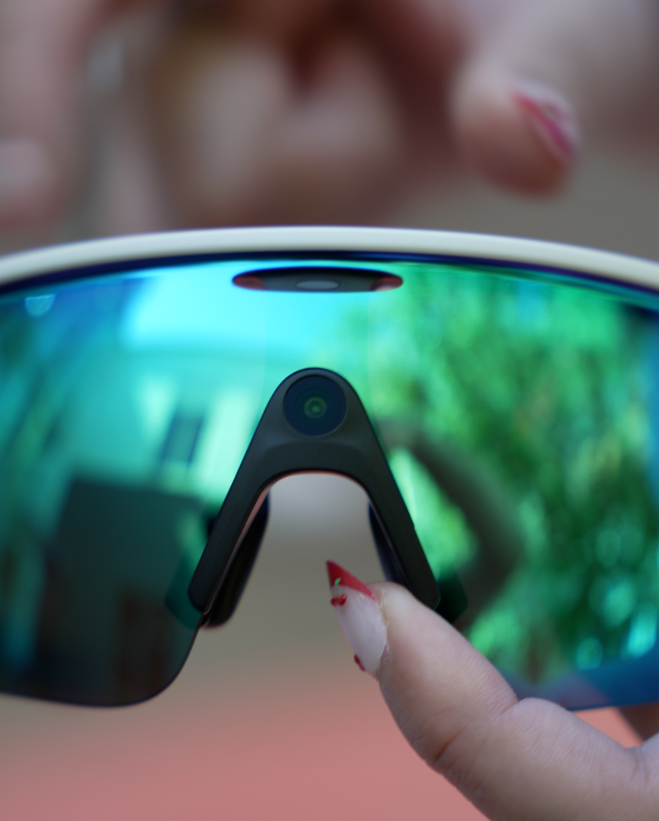 Close up of the Oakley Meta Vanguard with the camera in the nose bridge and LED light above it.