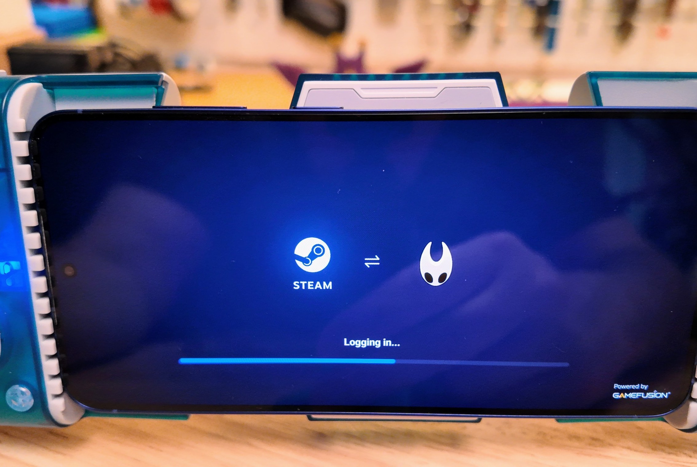Steam and GameHub working together to launch a game on a phone.