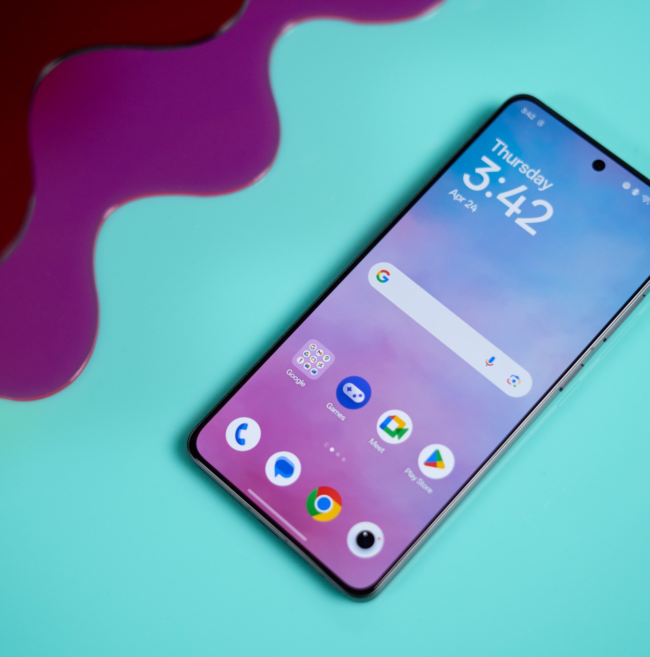 OnePlus 13R on a blue background