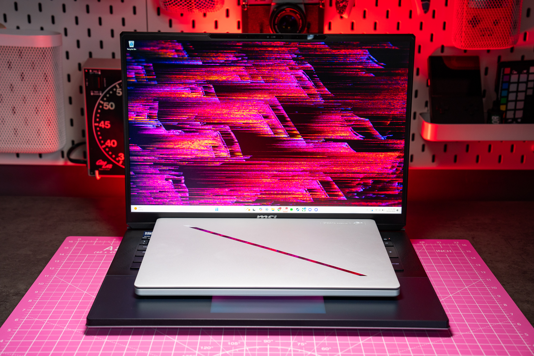 In case you were wondering, the Titan 18 is gargantuan enough to eat smaller gaming laptops like the Asus ROG Zephyrus G14.
