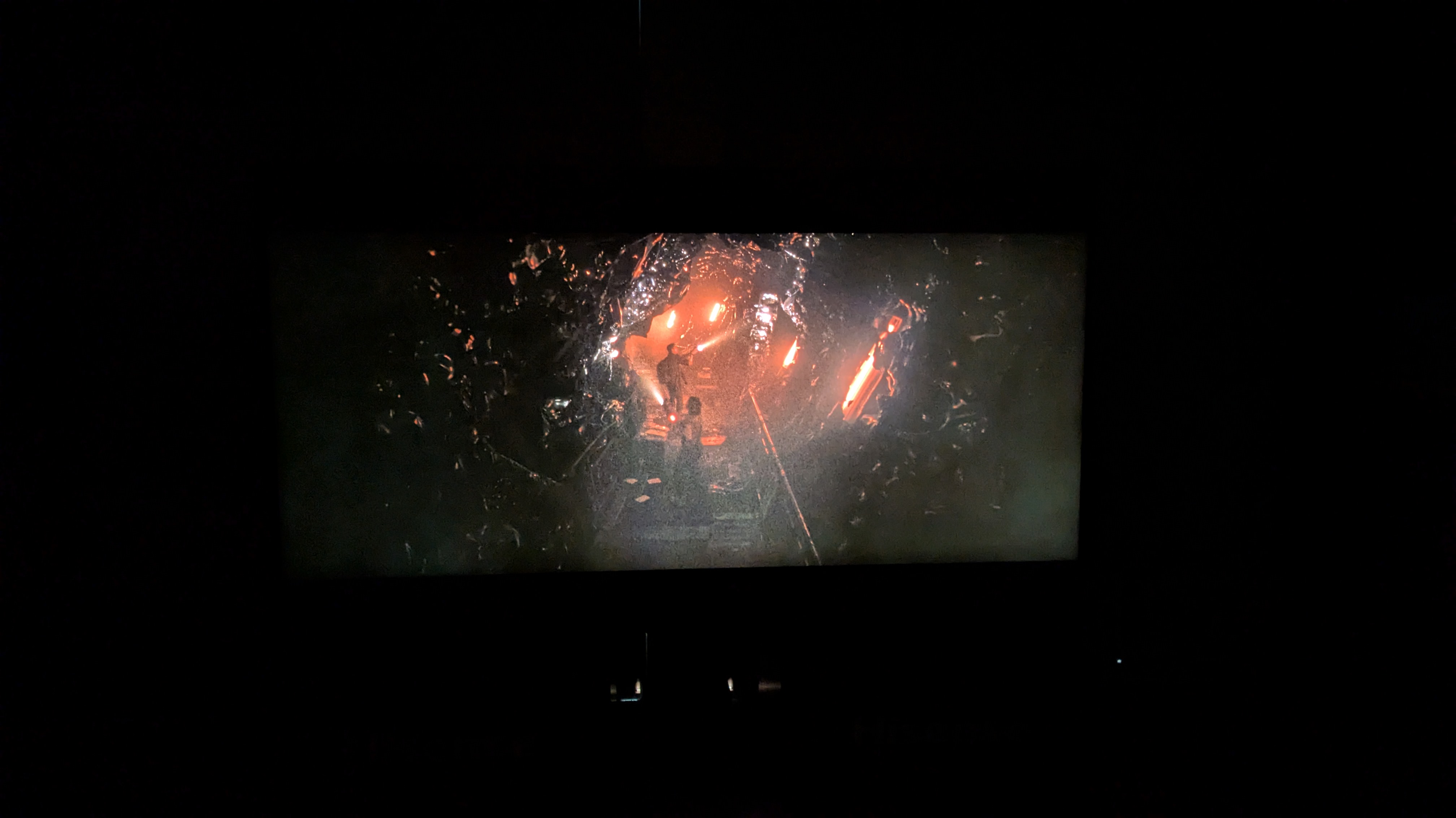 Hisense 116-inch UX RGB mini-LED TV displaying Alien Romulus in dark room 