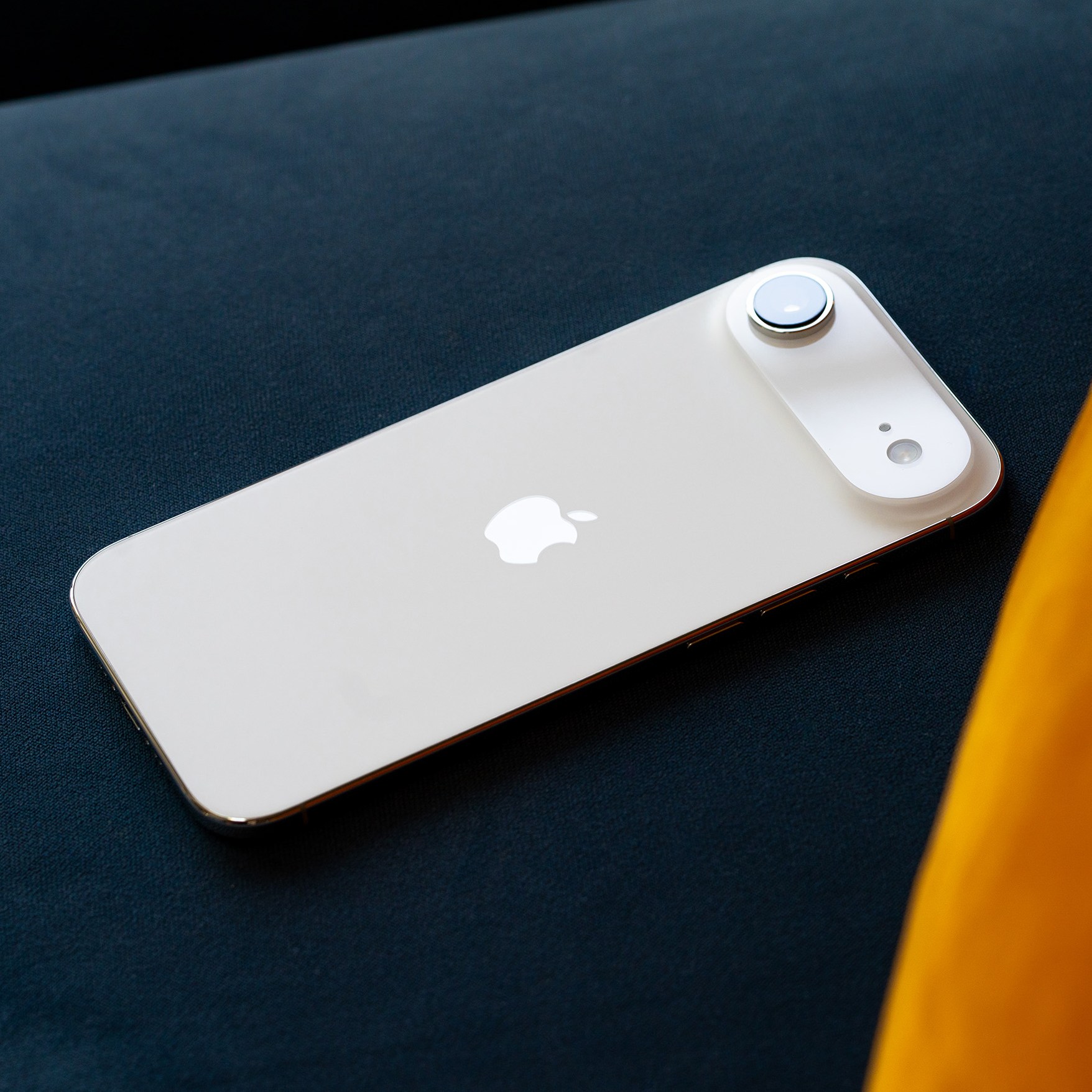 iPhone Air on a couch cushion