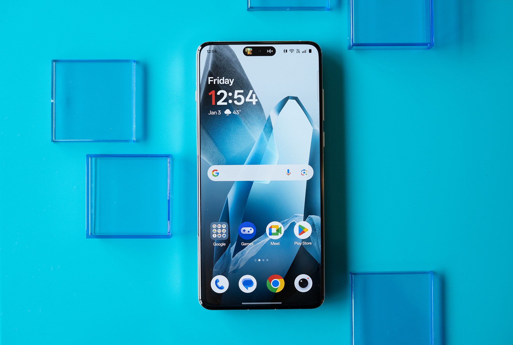 The OnePlus 13 in blue with vegan leather back panel.