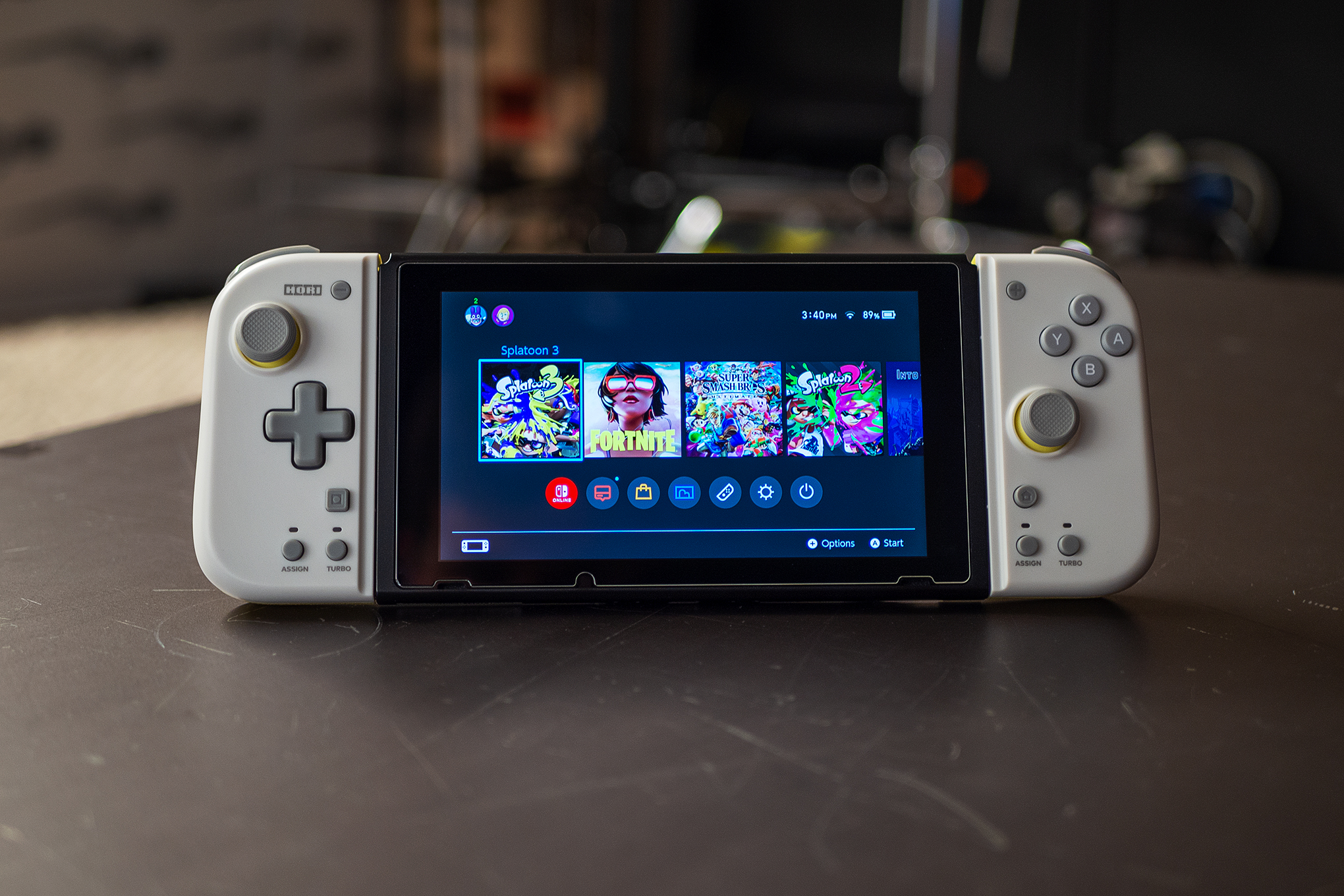 Nintendo Switch console shown with Hori’s Split Pad Compact controllers plugged in.