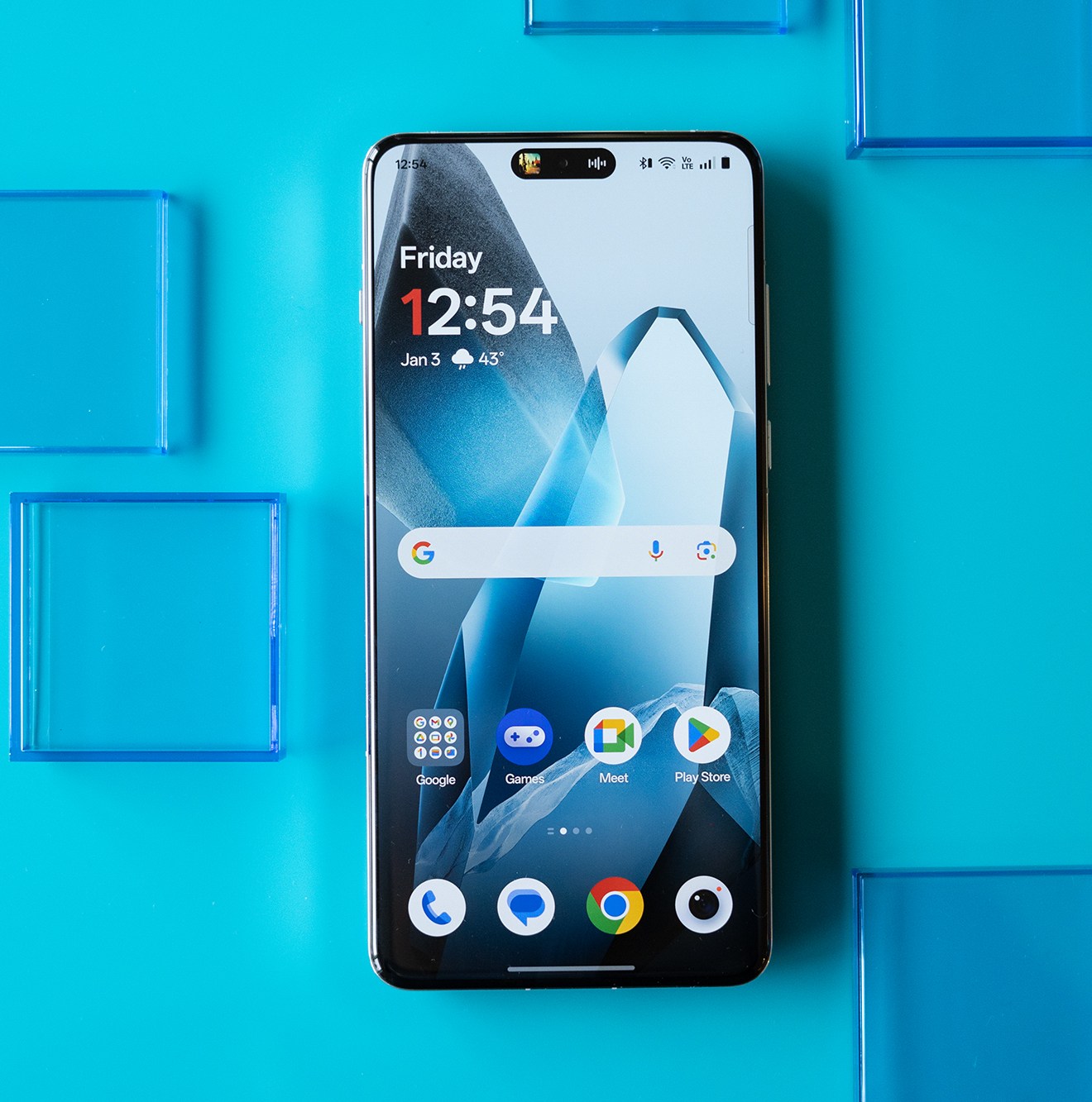 The OnePlus 13 in blue with vegan leather back panel.