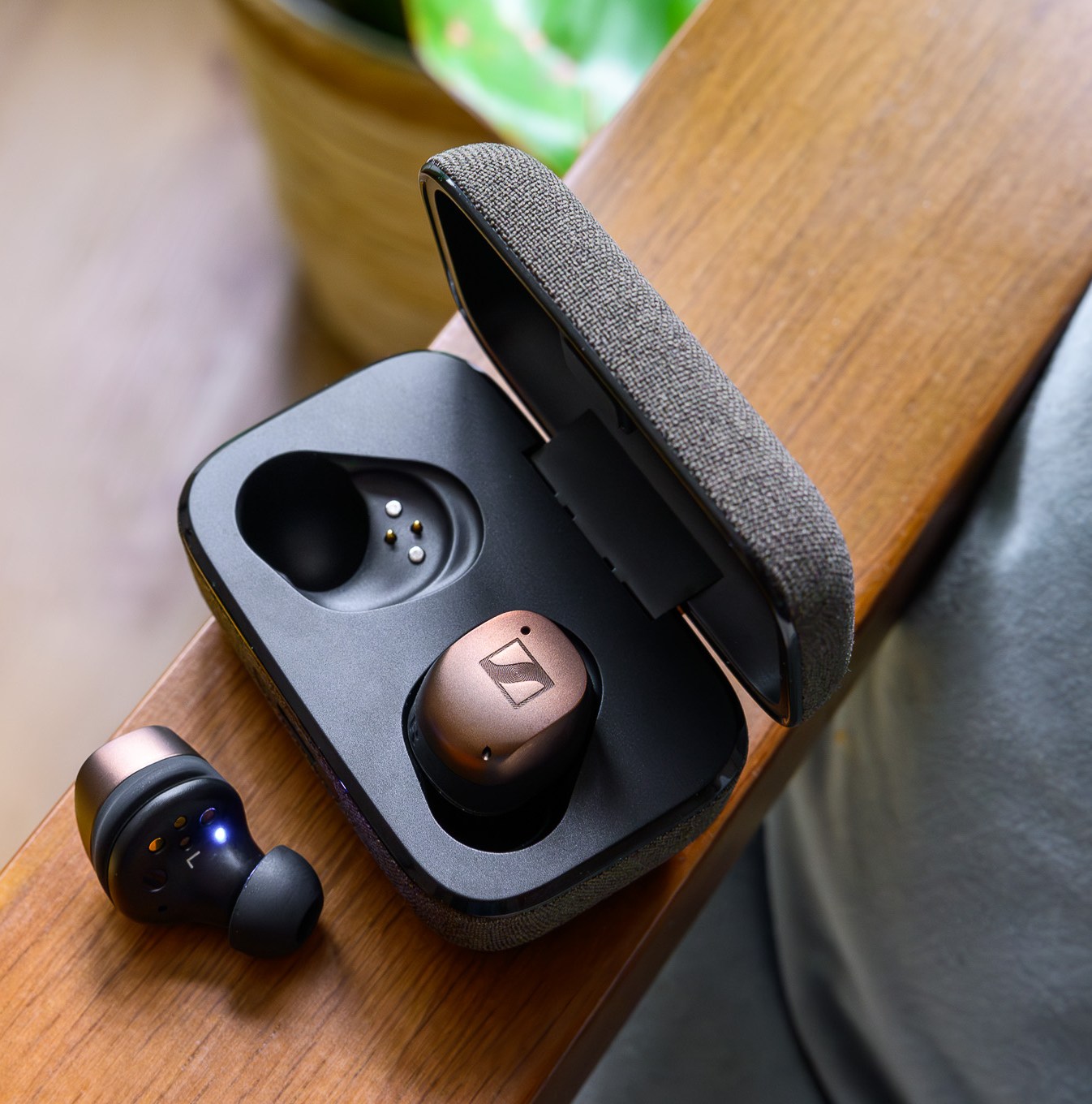 A photo of Sennheiser’s Momentum True Wireless 4 earbuds in copper.