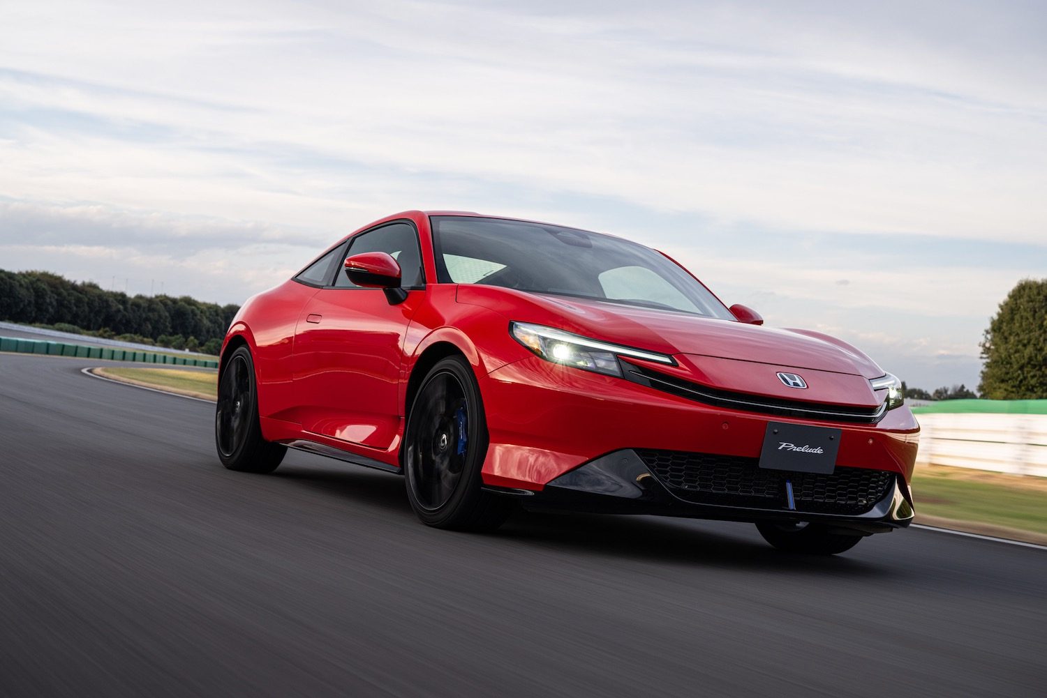 2026 Honda Prelude driving on a track.