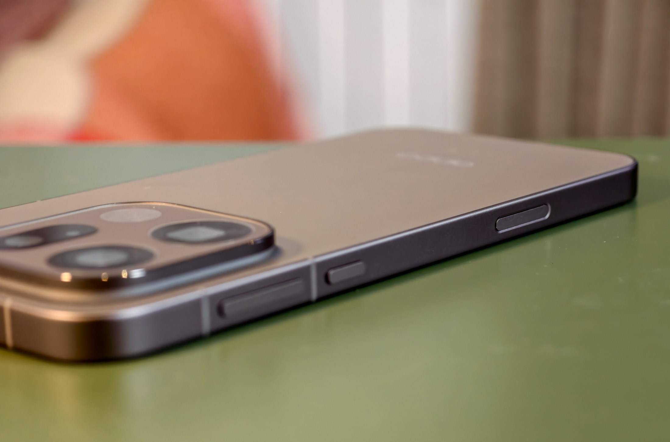 The touch-sensitive camera button is still a little awkwardly placed.