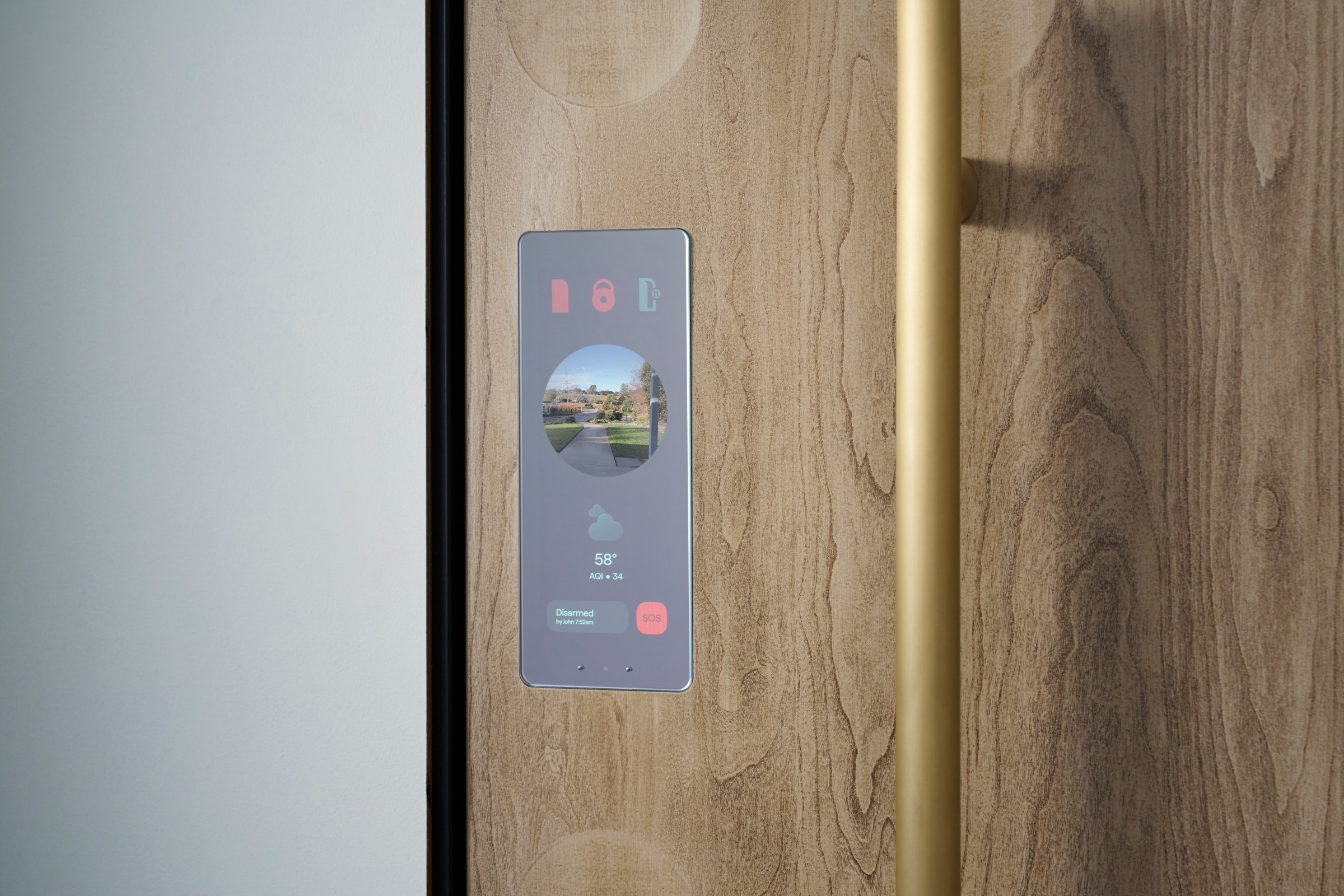 The interior screen is a smart home control panel that integrates with security systems. It includes controls for the integrated lock and a screen for viewing the doorbell’s live feed.