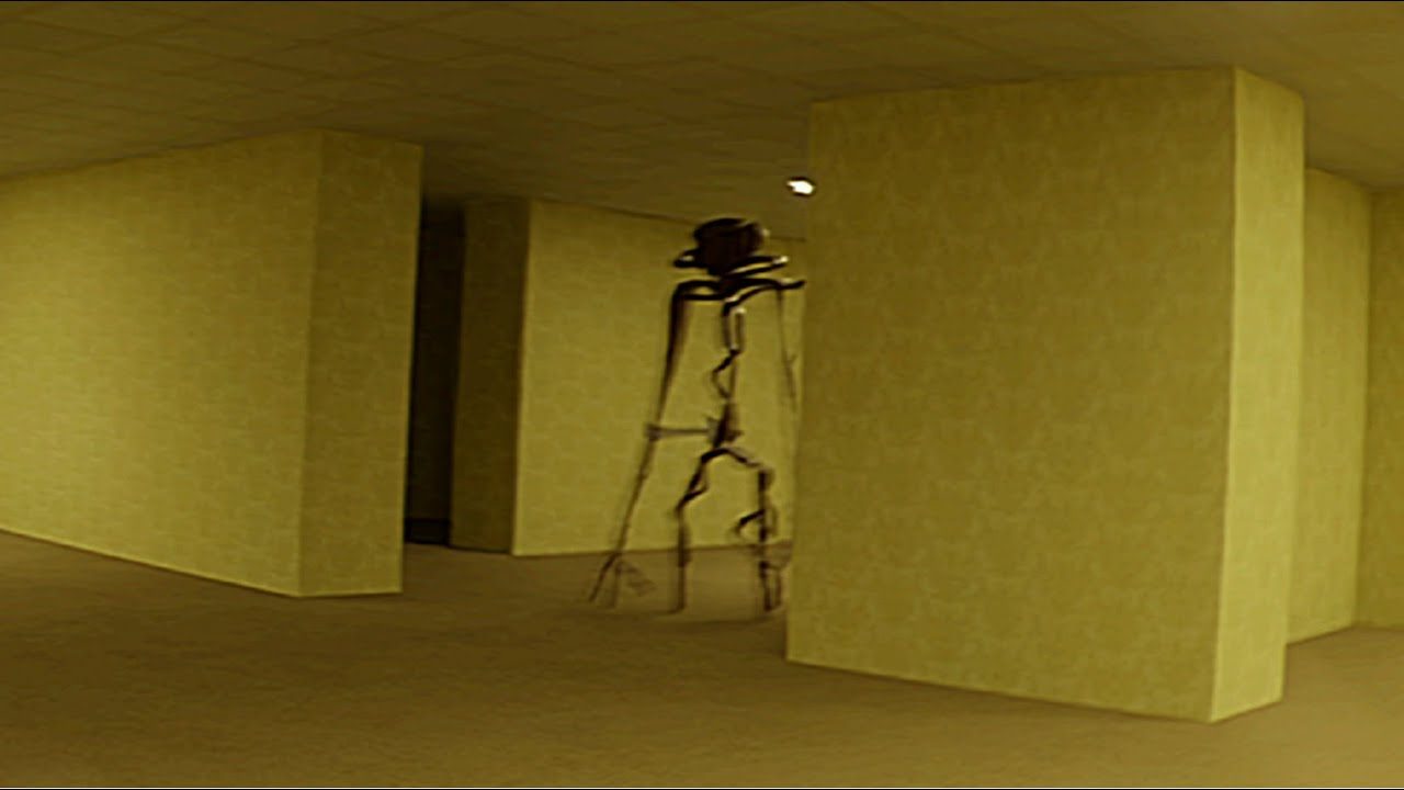 A strange figure in a yellow hallway in the short film The Backrooms