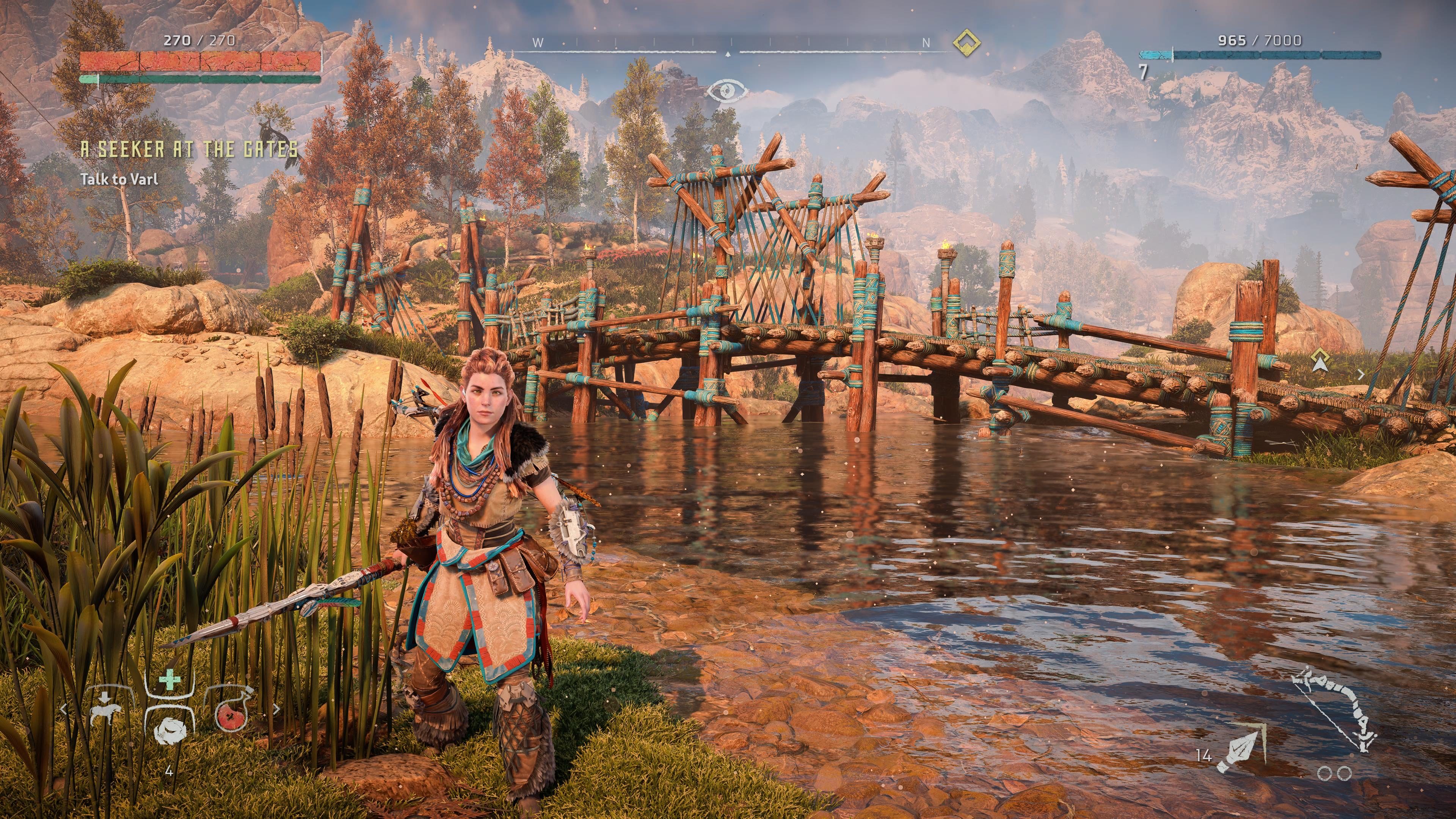 Aloy squats near a bush in Horizon Zero Dawn Remastered.