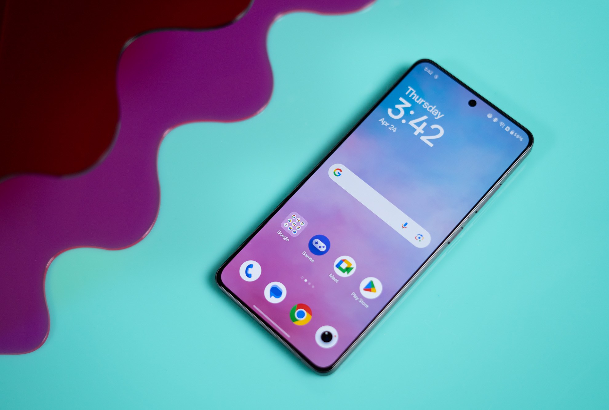 OnePlus 13R on a blue background